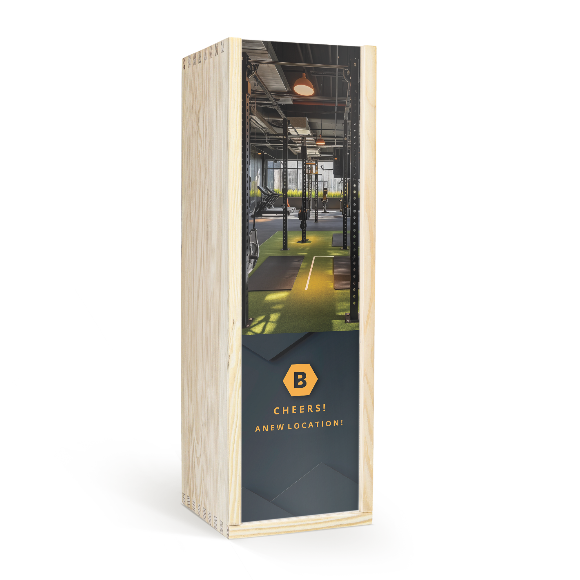 Amaretto Disaronno bottle in a personalised wooden case printed with a gym image and text Cheers A New Location