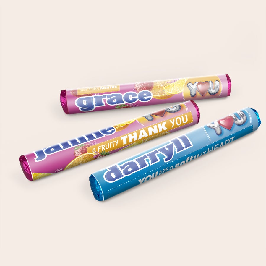 Mentos-rullat lahjapakkauksessa kuvalla ja/tai tekstillä Mentos-rullat lahjapakkauksessa kuvalla ja/tai tekstillä