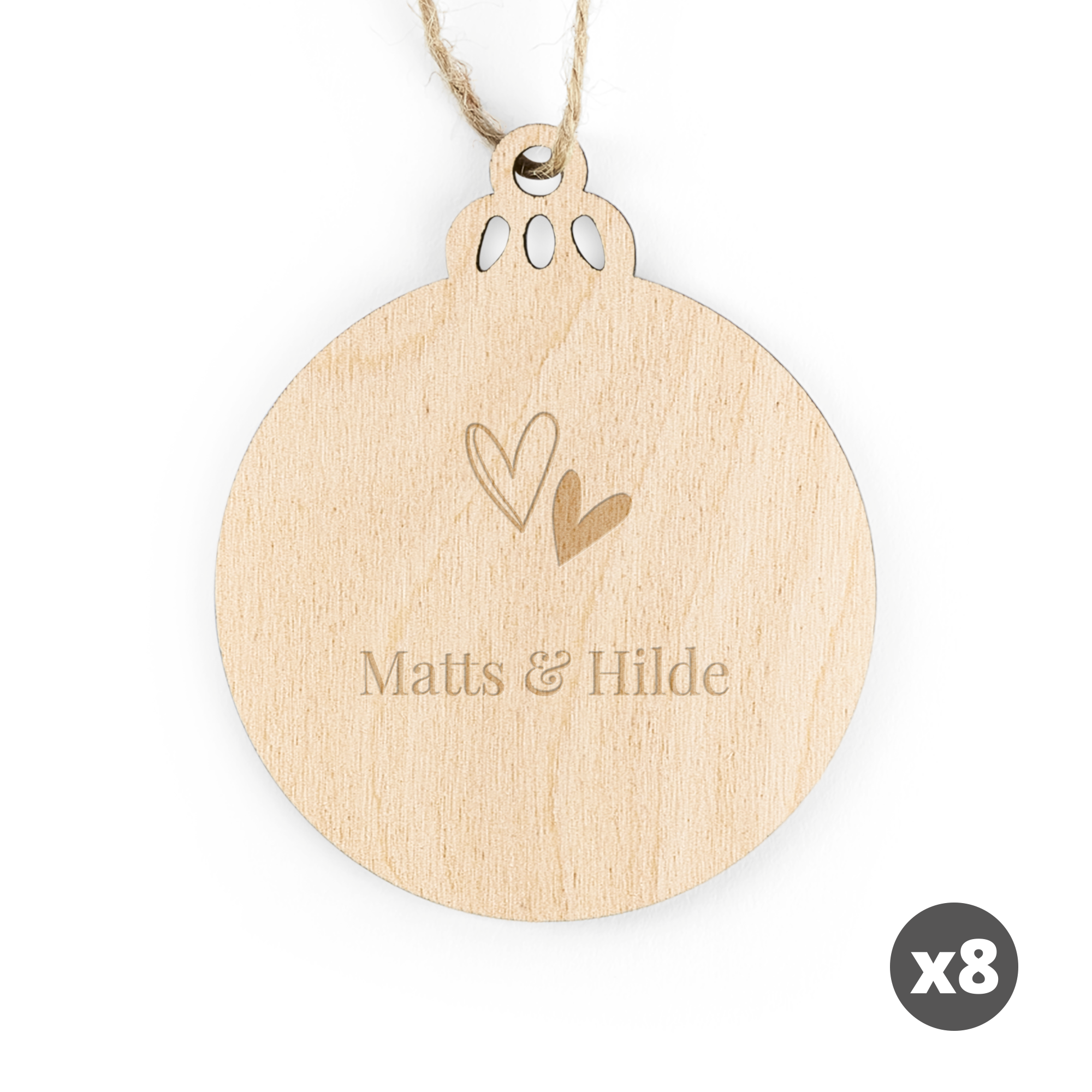 Gravert julestjernedekorasjon i tre