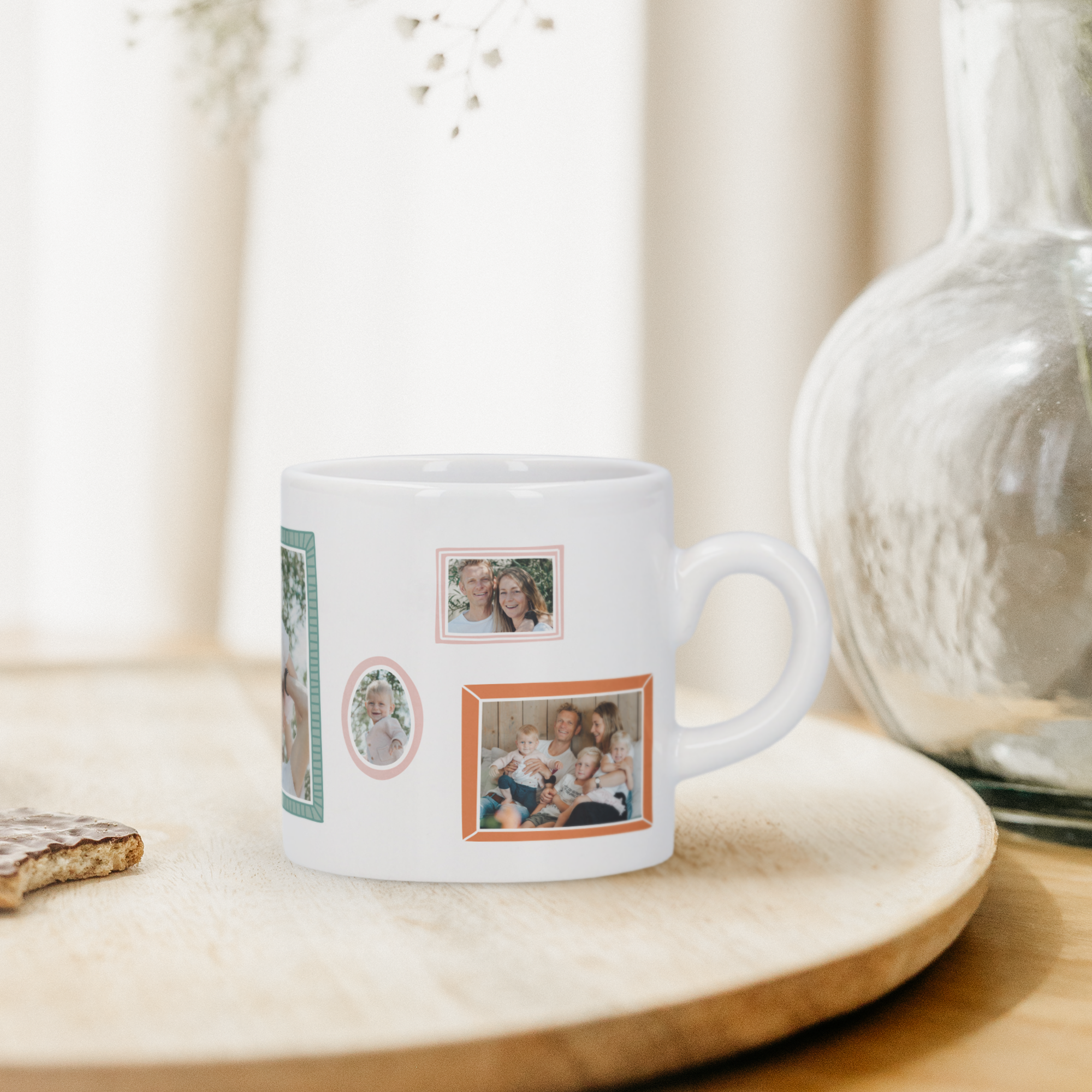 White personalized espresso mug printed with multiple family photos, on a wooden tray.