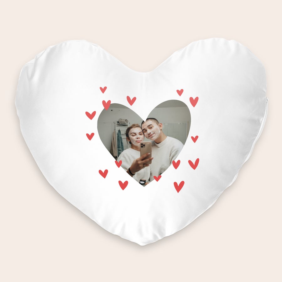 Pillow - Heart White heart-shaped cushion printed with a photo of a couple and surrounded by small red hearts. Customize this heart shaped cushion with your own photo.