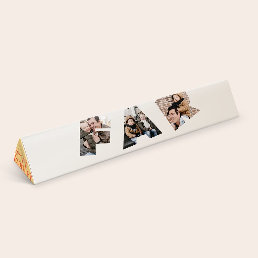 Toblerone med navn En stor personlig Toblerone chokolade med ordet FAR printet med egne billeder.