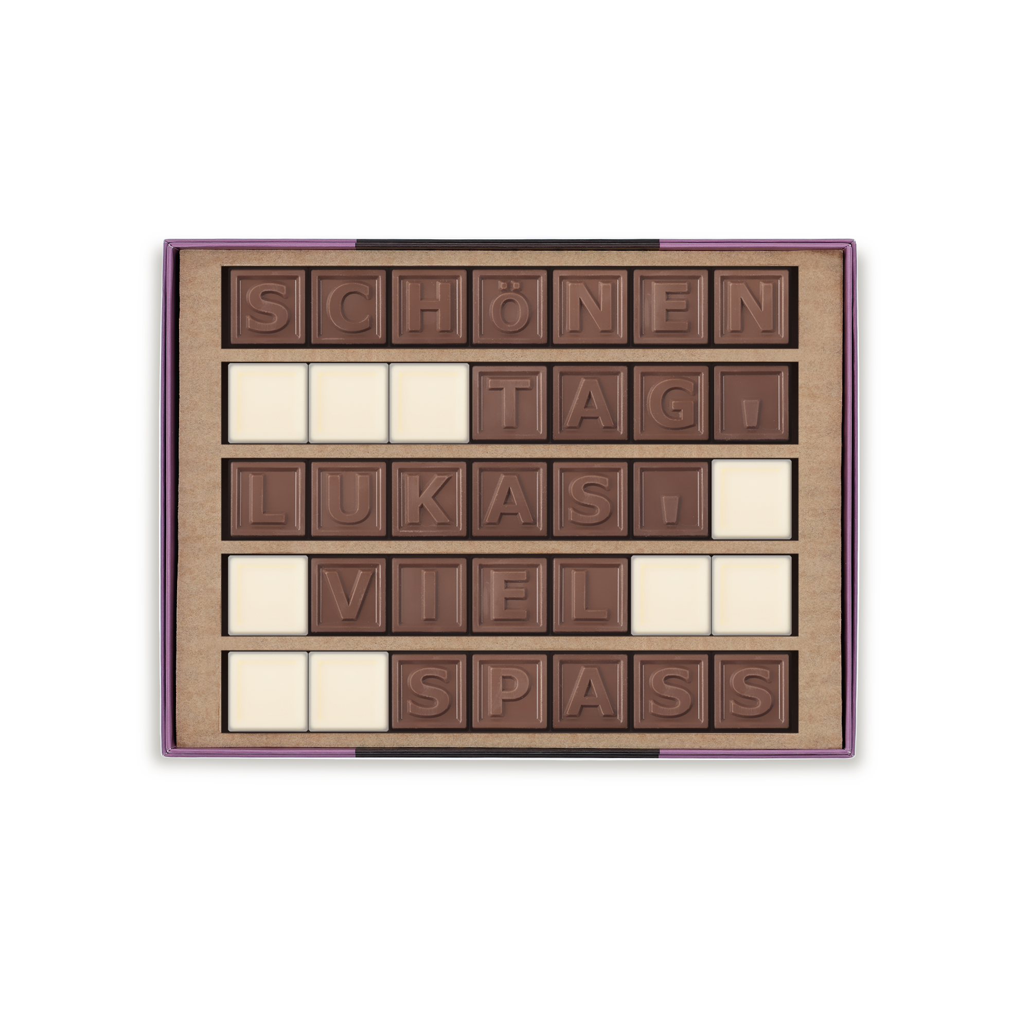 Dein persönliches Schoko-Telegramm mit der Nachricht "Schönen Tag Lukas! Viel Spaß!" aus personalisierten Milchschokoladenbuchstaben und weißen Schokoladenfüllstücken, lecker!