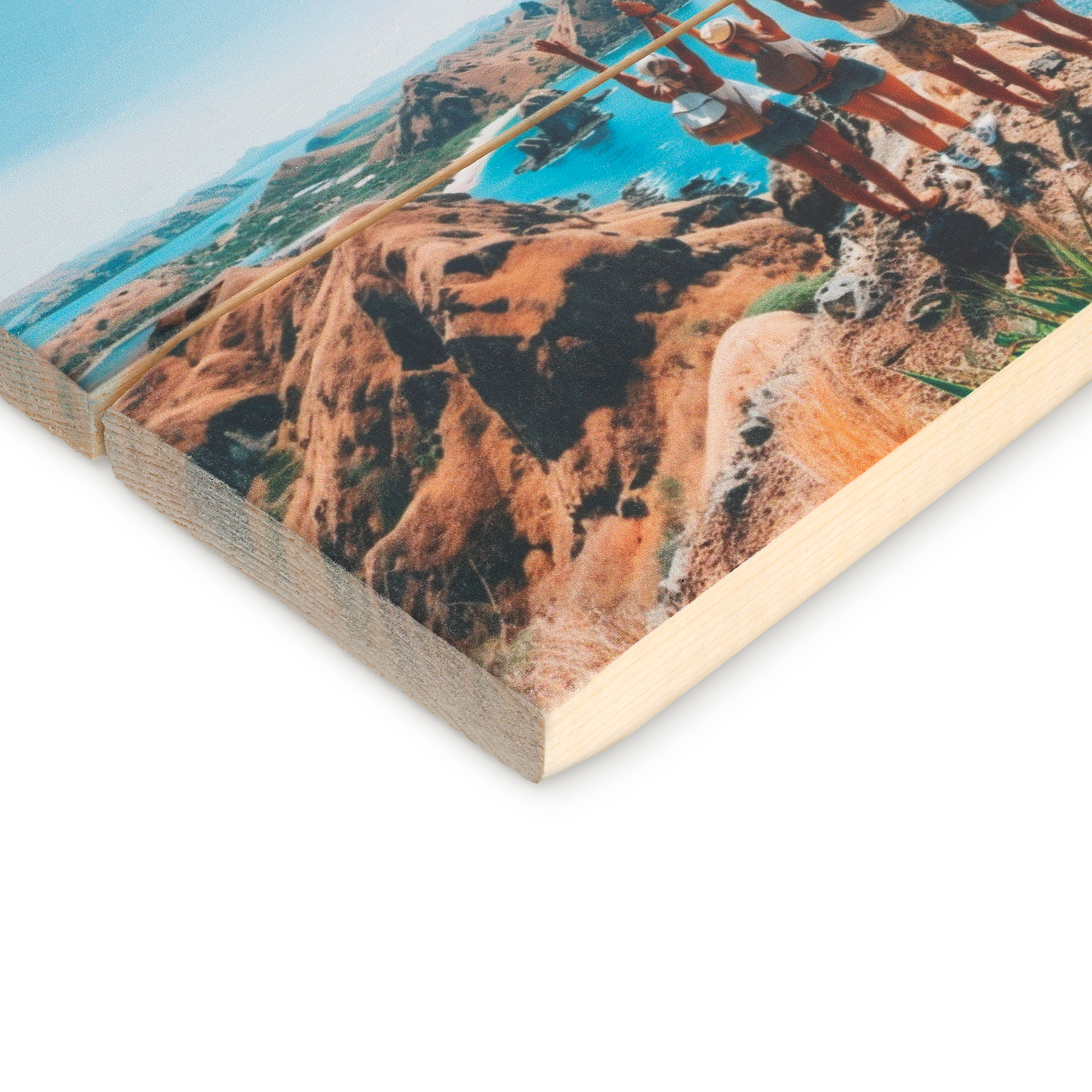 Personalized photo printed onto wooden planks with a vibrant image of a coastal landscape.