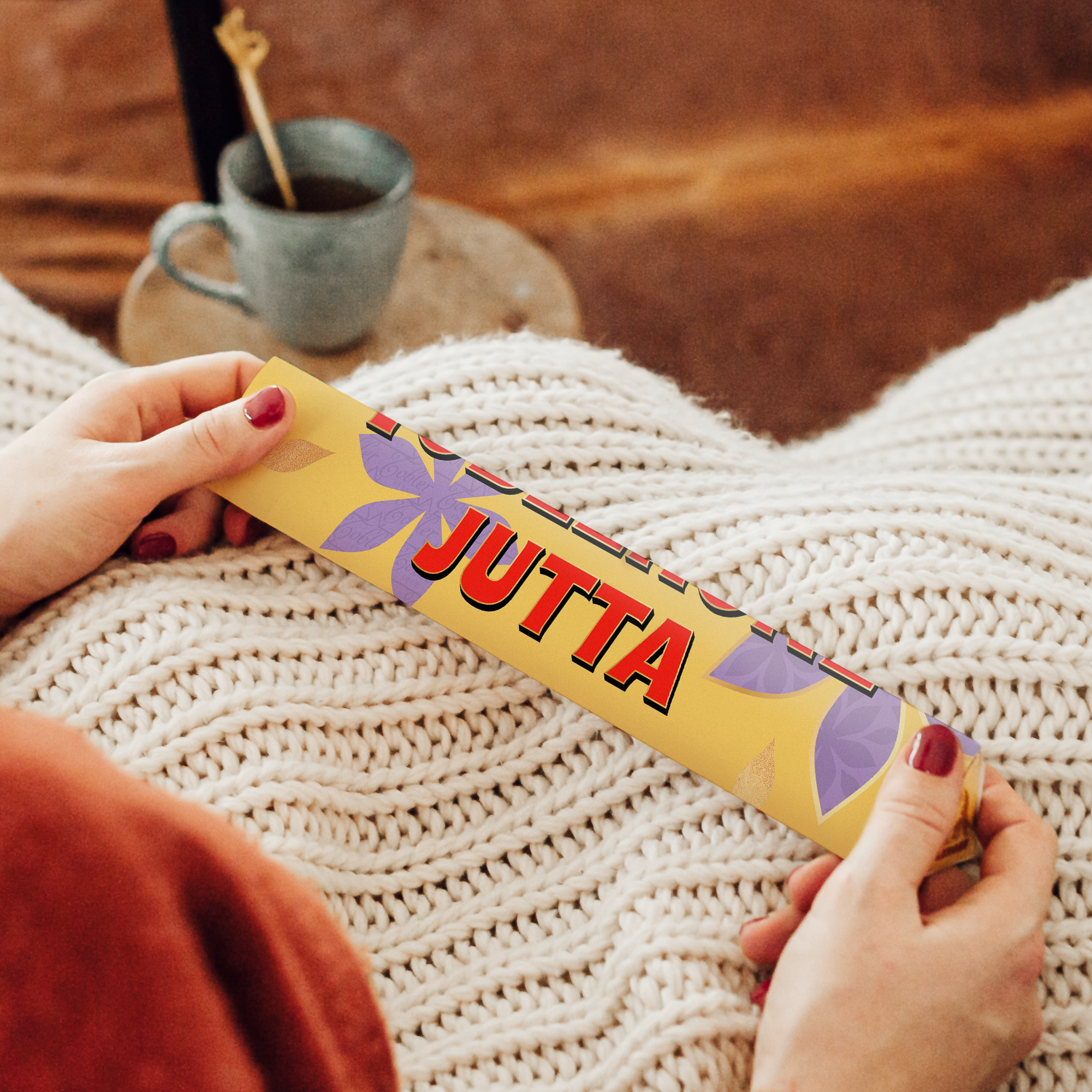 Personalisierte Toblerone-Tafel für Mama mit dem Namen Jutta, gedruckt auf gelber Verpackung