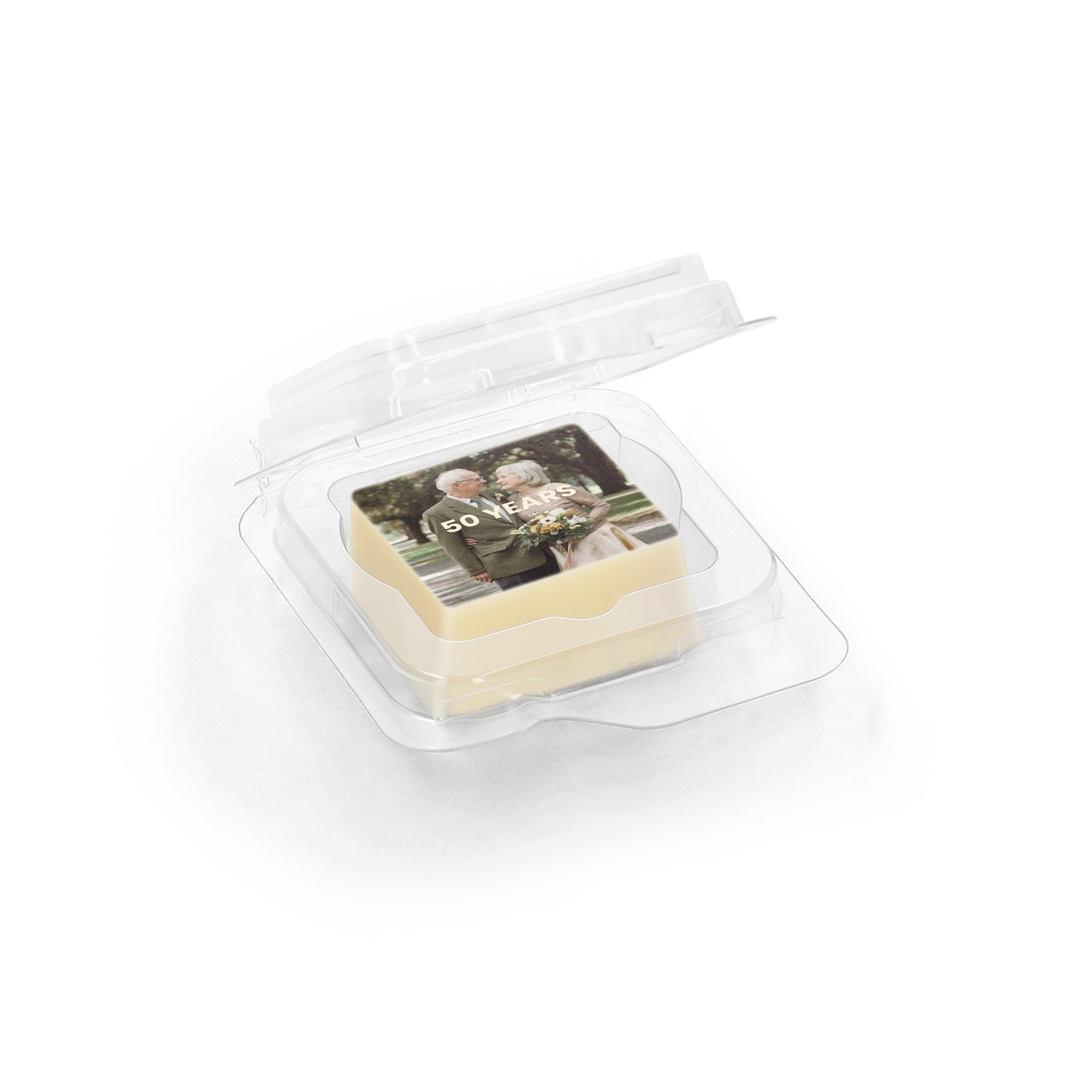 Praline chocolate favour in a clear plastic package printed with a photo of a couple and the text 50 Years