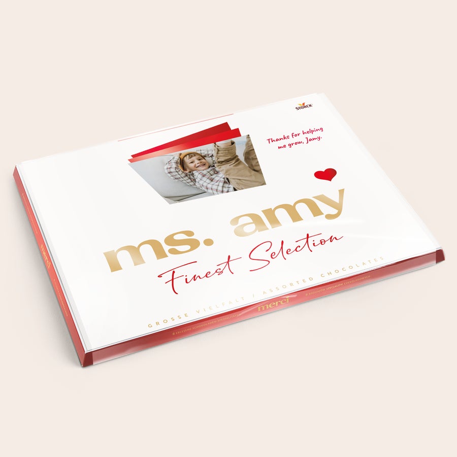 Personalised Merci Chocolate Gift Box & Greeting Card Merci chocolate with personalised card - 675 grams with a photo of a boy and text ms. amy finest selection printed on the custom wrapper