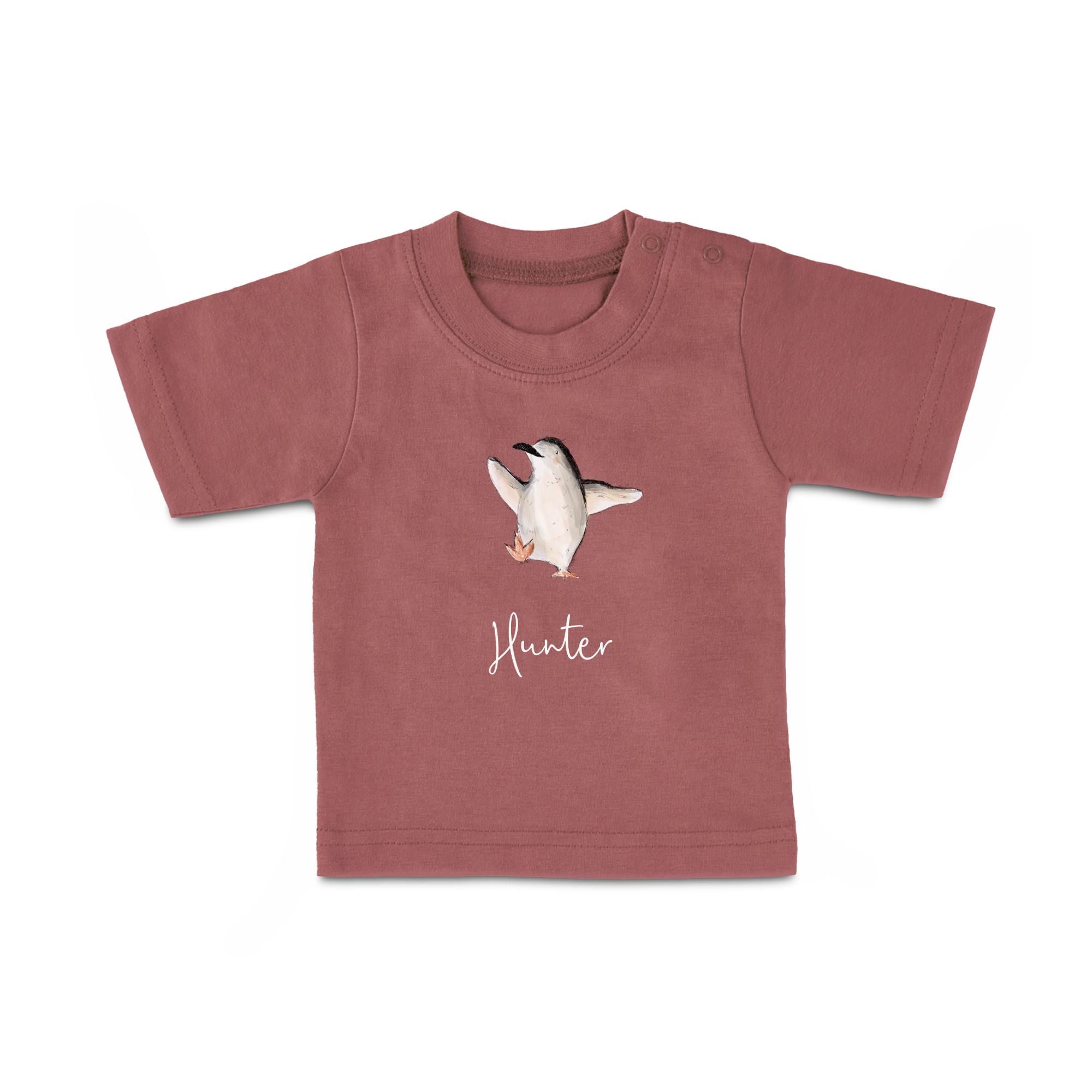 Personalized baby shirt with a dancing penguin illustration and the printed name Hunter