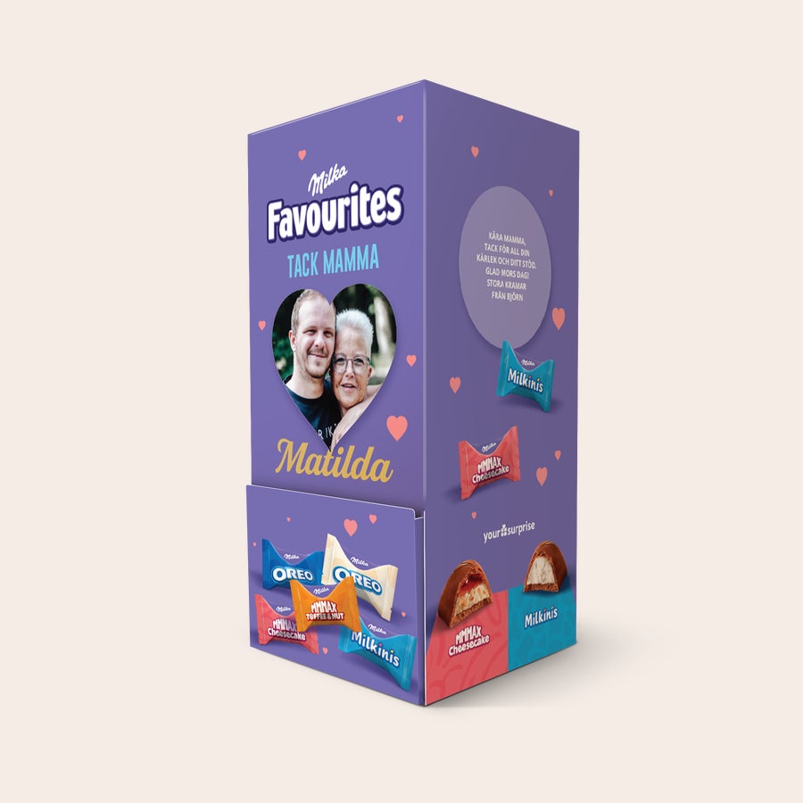 Milka Favorites chokladdispenser Lila Milka chokladdispenser med tryckt foto av man och kvinna i ett hjärta, texten "Matilda" och "Tack mamma". Detta är en personlig Milka Favorites chokladdispenser.