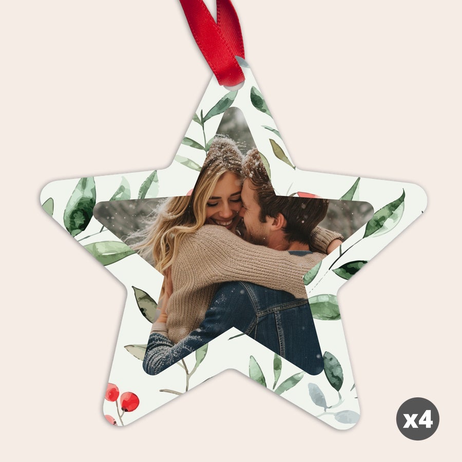 Personalised Christmas ornaments Star-shaped aluminium Christmas decoration with a personalized photo of a couple and a leafy design, featuring a red ribbon
