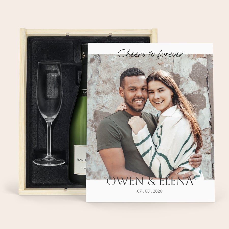 Personalised Wine - Rene Schloesser gift set with glasses Personalised champagne gift set - René Schloesser (750ml) - Printed wooden case with a photo of Owen and Elena, dates, and "Cheers to forever"