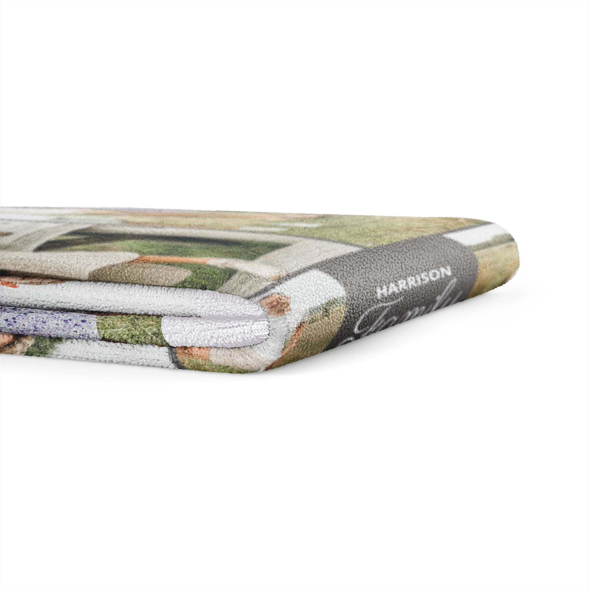 Asciugamano personalizzato piegato con foto stampata e la scritta "HARRISON" sul bordo, perfetto per sorprendere una persona speciale