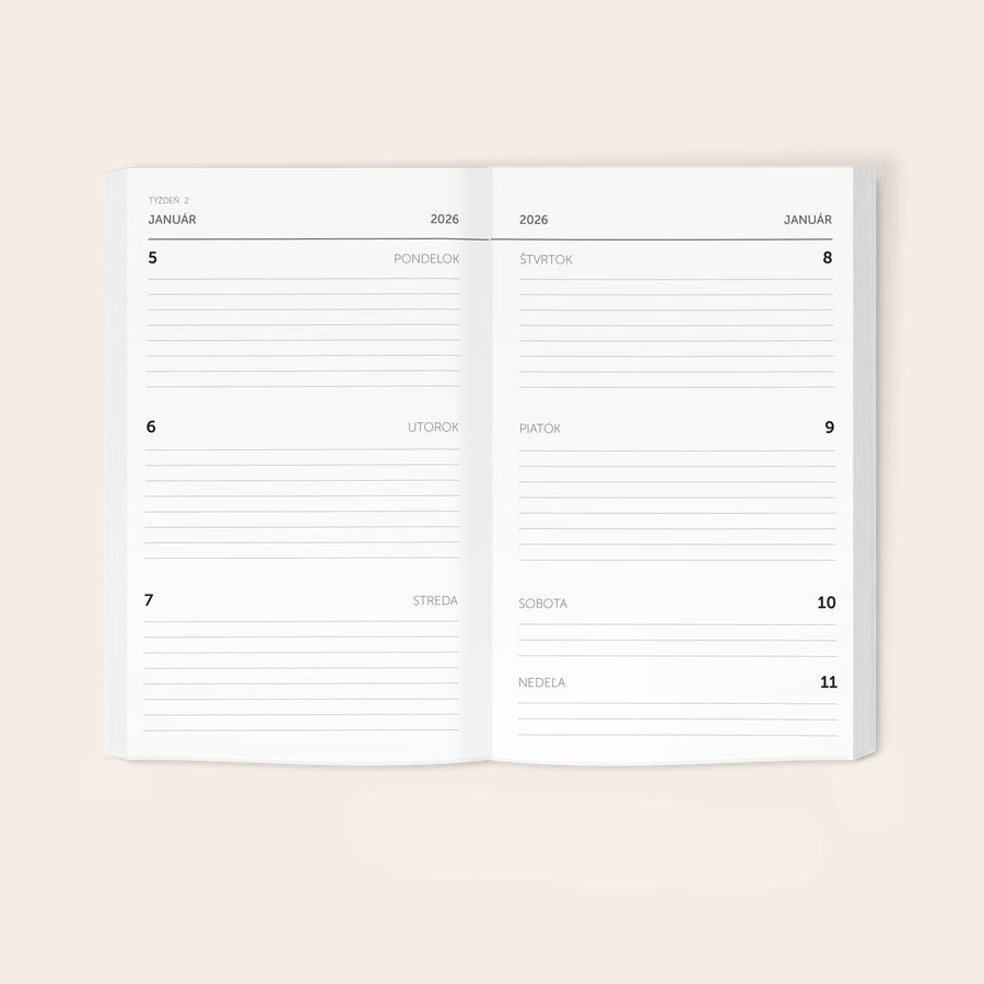Vlastný plánovač Otvorený personalizovaný diár na rok 2026 s dátumami v januári, pripravený na vyplnenie.