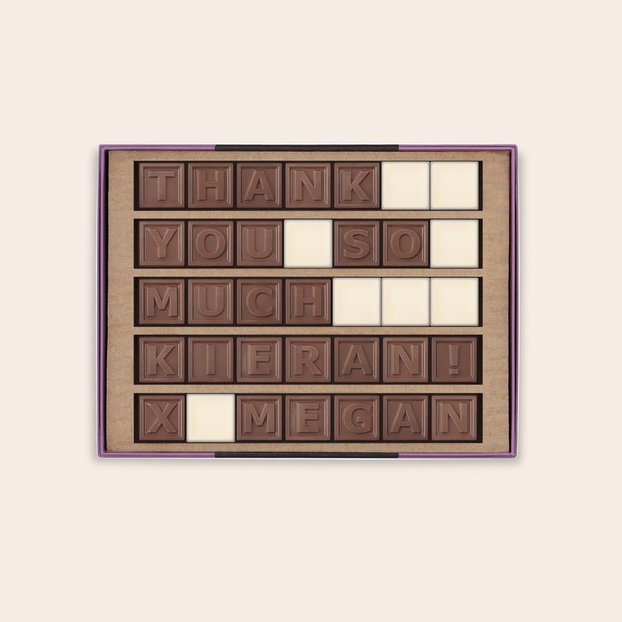 Personligt Chokolade Telegram Dit personlige chokoladetelegram med "THANK YOU SO MUCH KIERAN! X MEGAN" lavet af mælke- og hvid chokolade.
