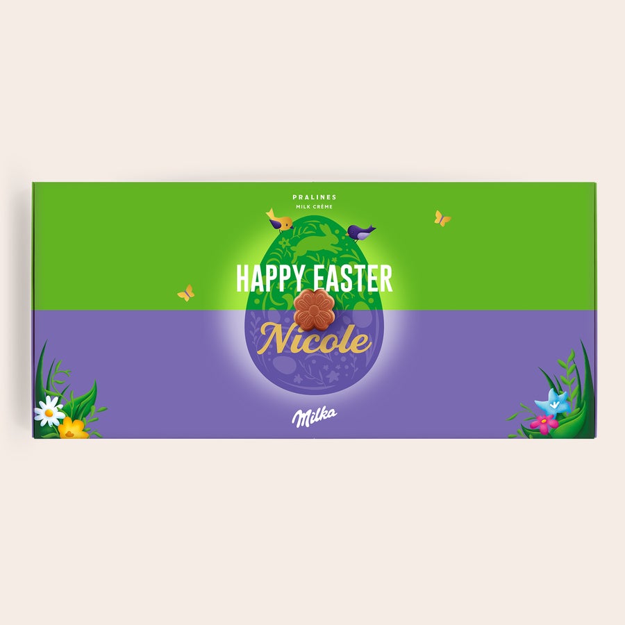Milka Pralinky Velikonoce Personalizovaná dárková krabička Řekni to s Milka, potištěná zelenofialovým velikonočním motivem, textem Happy Easter a jménem Nicole.