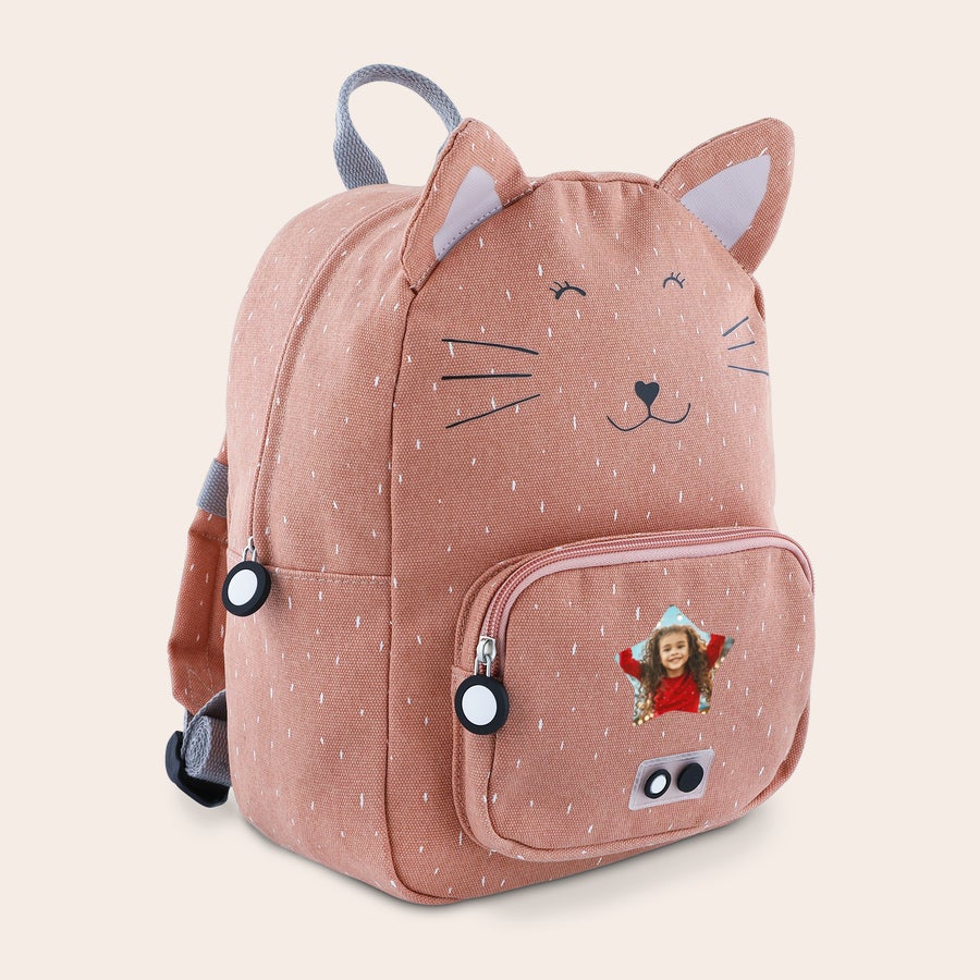 Zaino per Bambini Personalizzato - Trixie Zaino per bambini a forma di gatto rosa con occhi, naso e baffi stampati e una foto stampata di una bambina sorridente