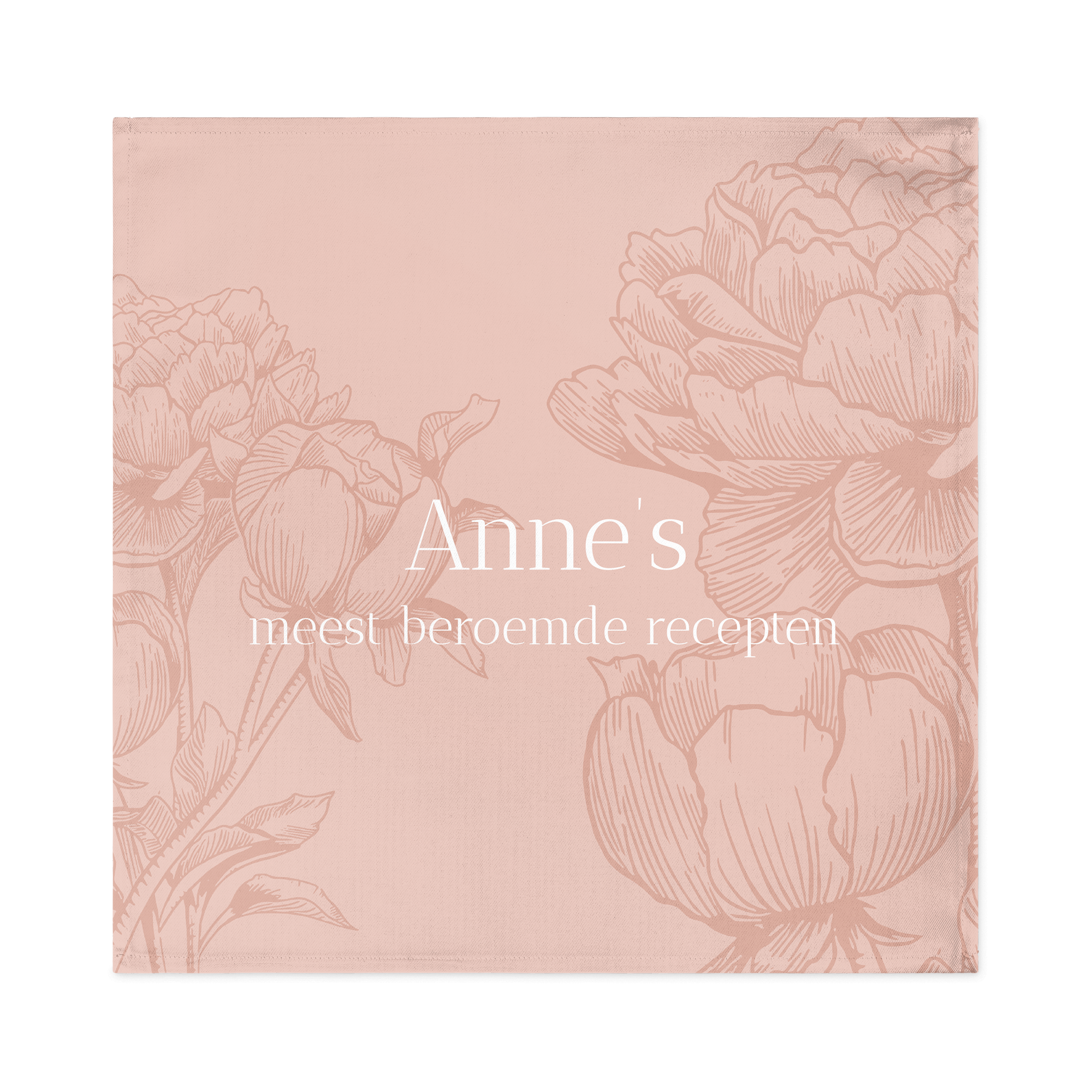 Roze servet, bedrukt met illustraties van pioenrozen en de persoonlijke tekst "Anne's meest beroemde recepten". Het dekken van de tafel wordt een feestje met unieke bedrukte servetten.