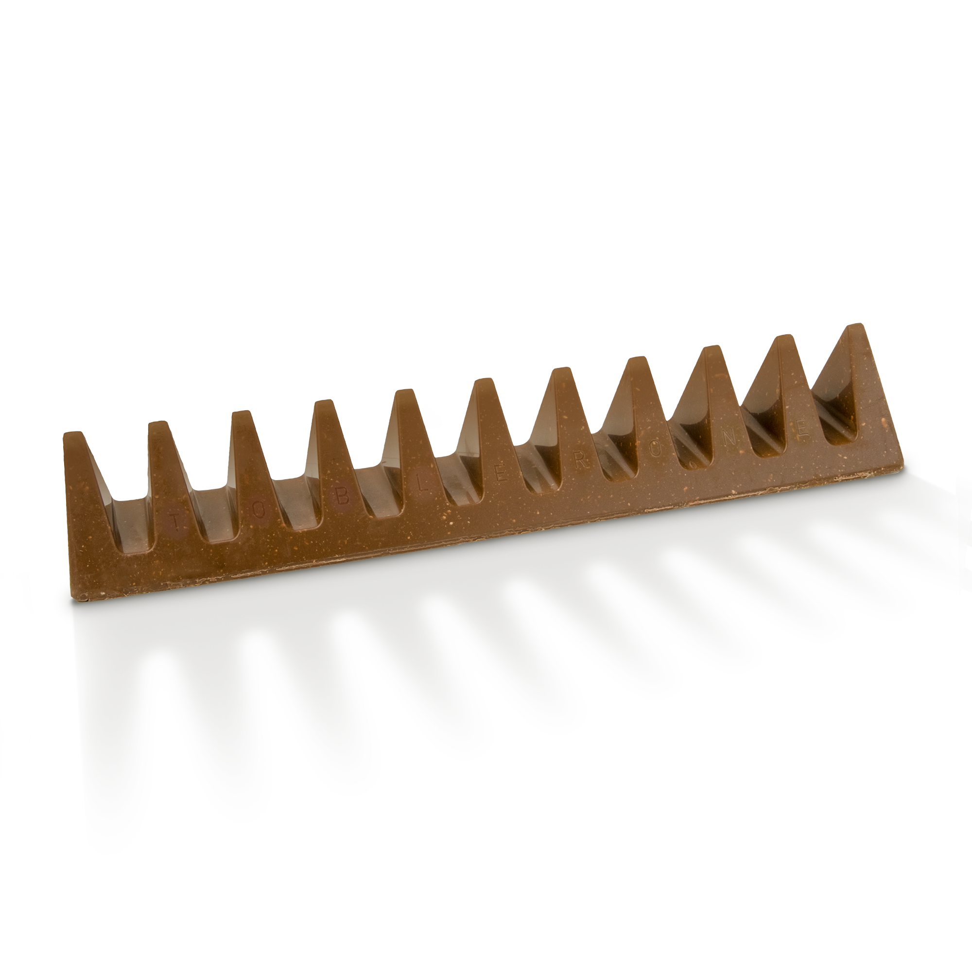 Személyre szabott Toblerone csokoládé mézzel és mandula nugáttal, a "TOBLERONE" név dombornyomással díszítve a csokoládén.