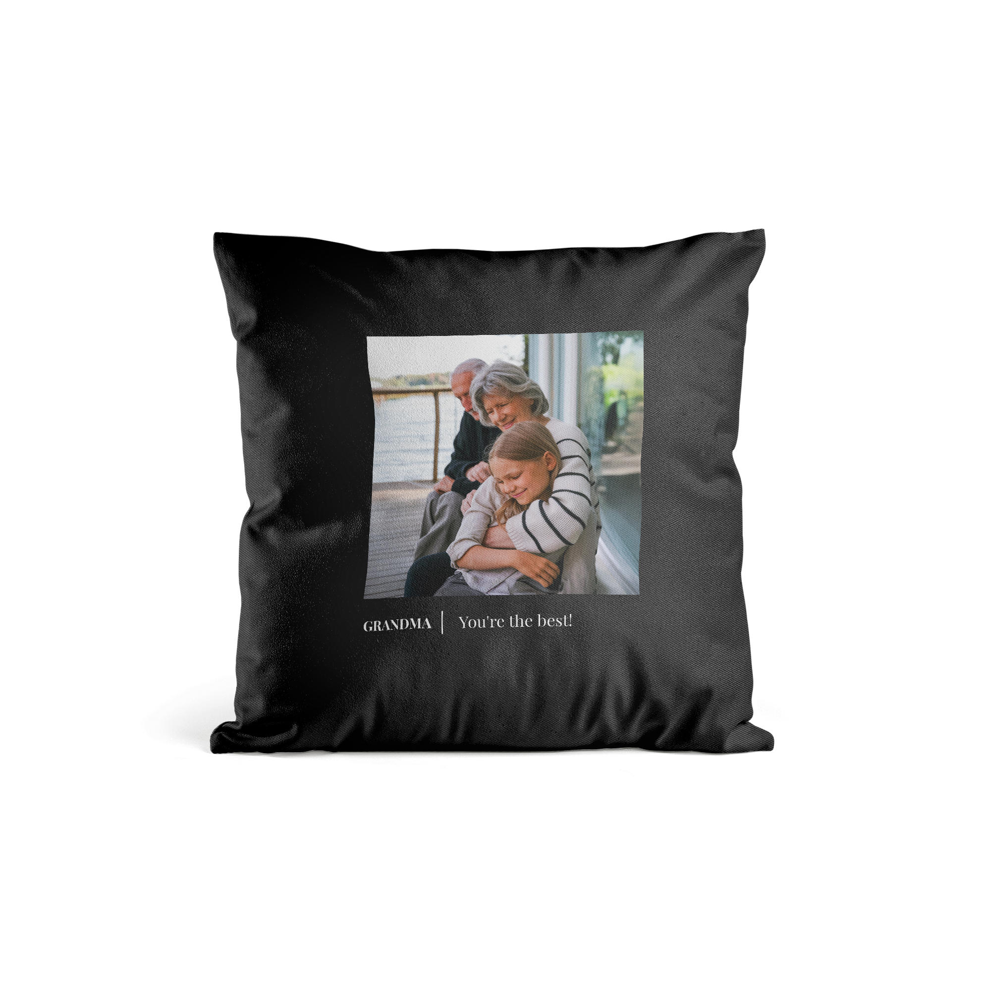 Black personalised cushion case printed with a photo of a grandma and granddaughter, and the text Grandma Youre the best
