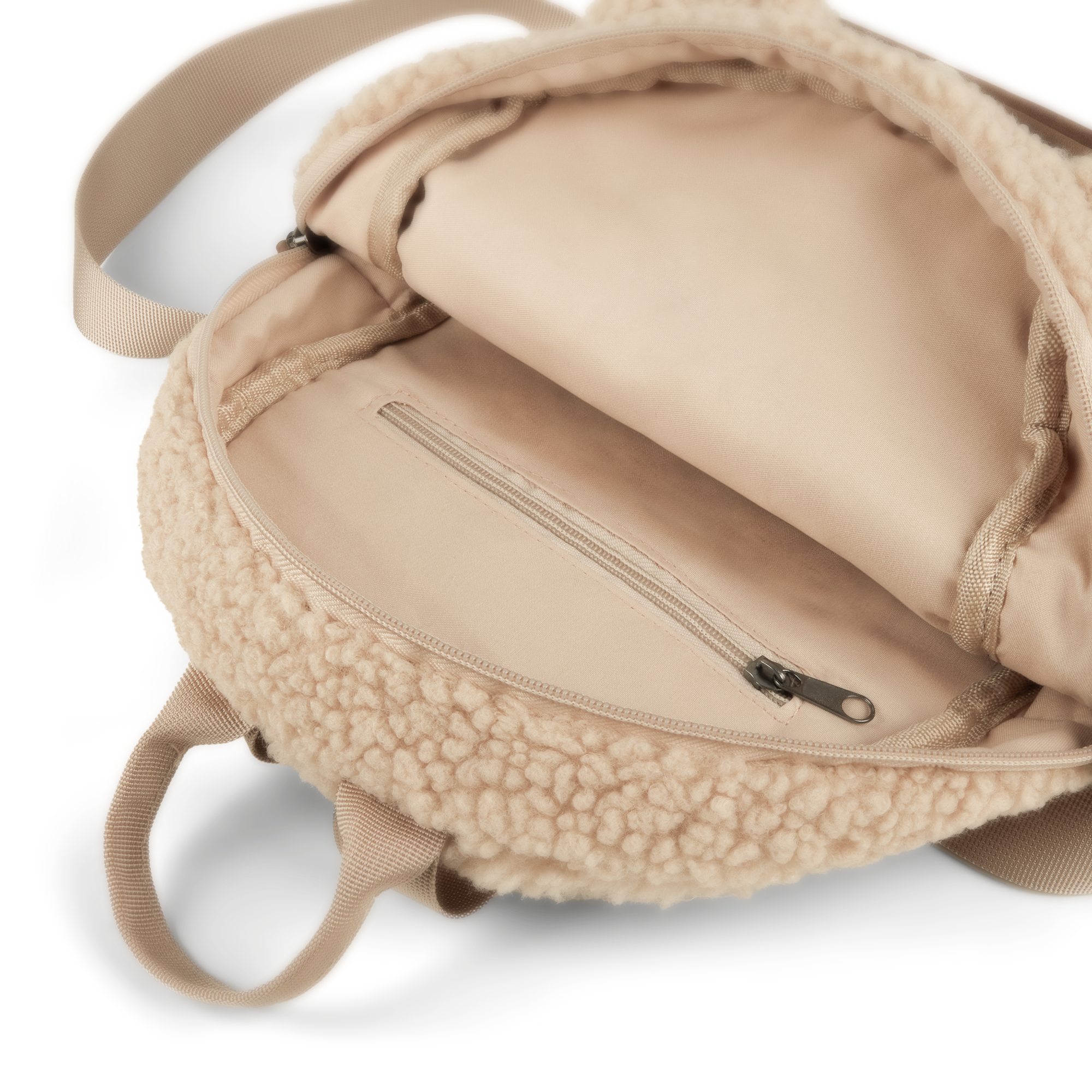 Open personalized teddy backpack with a beige interior and visible zipper pocket