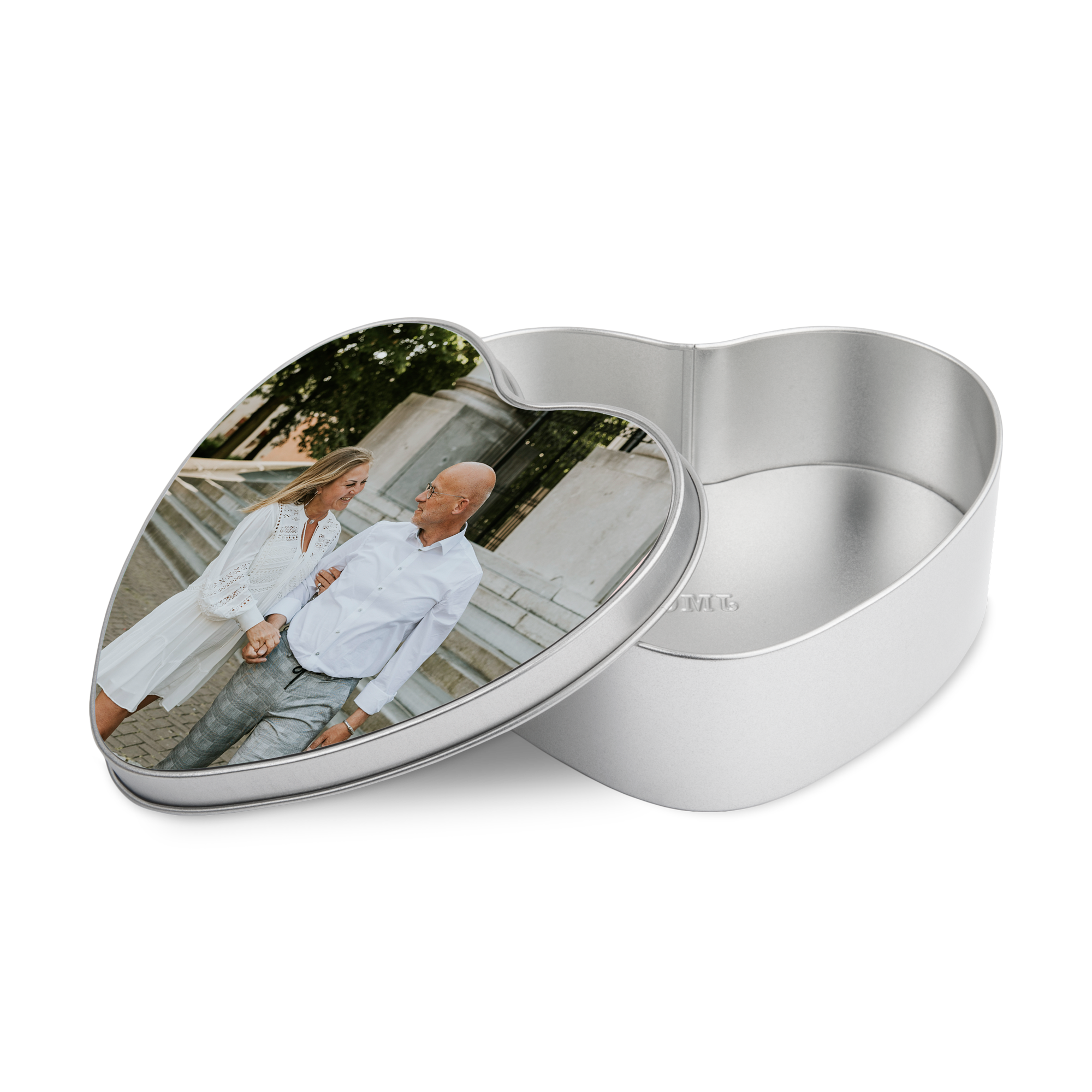 Hartvormig Valentijns cadeaublik met gepersonaliseerde foto van een stel, deels open.