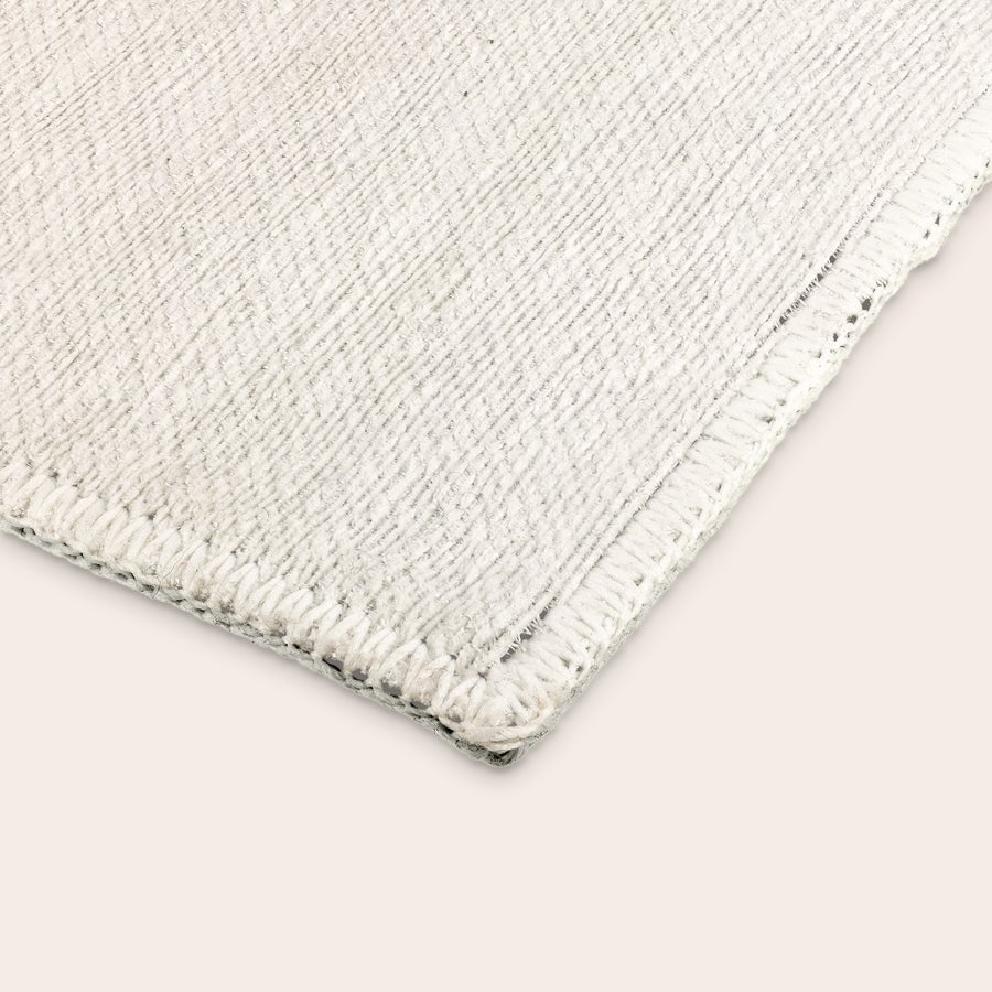 Tapete estampado Tapete personalizado liso com textura diagonal, borda costurada para um elemento aconchegante para o chão.