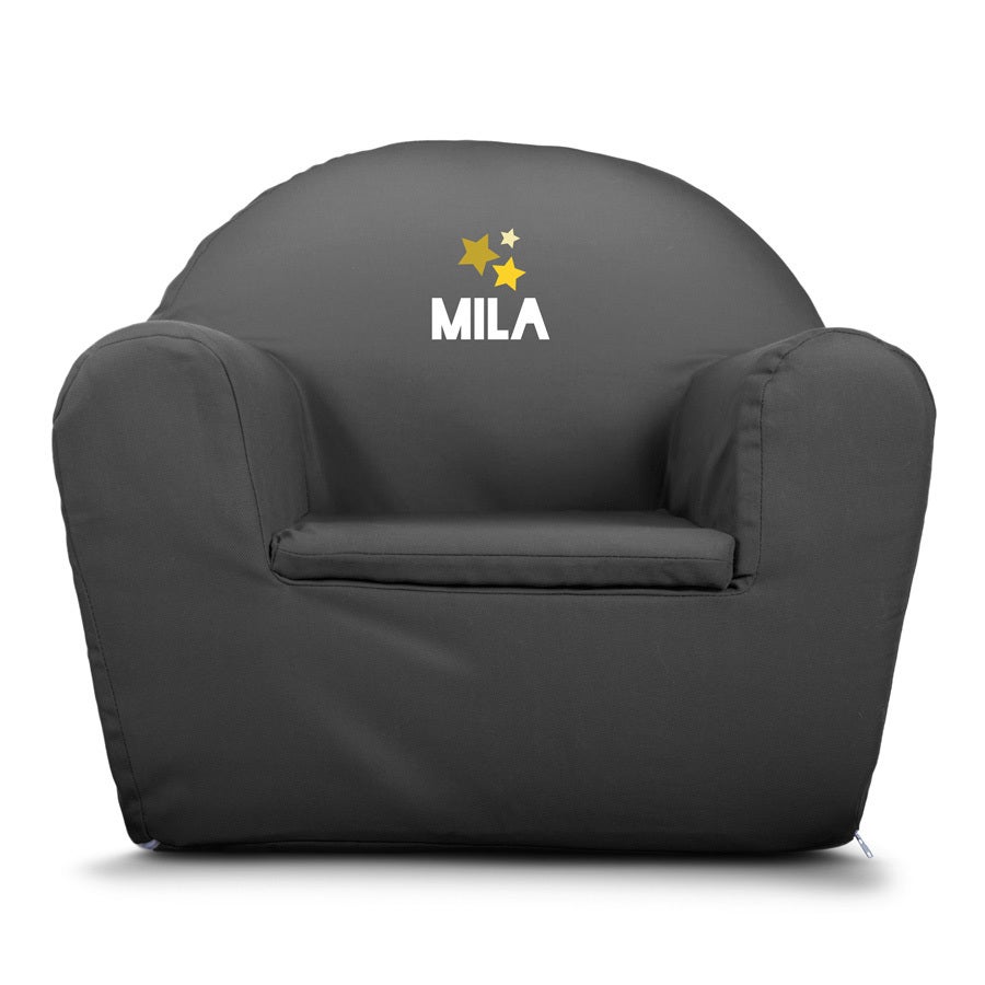 Dark gray toddler's chair with the name Mila and three stars printed in yellow and white