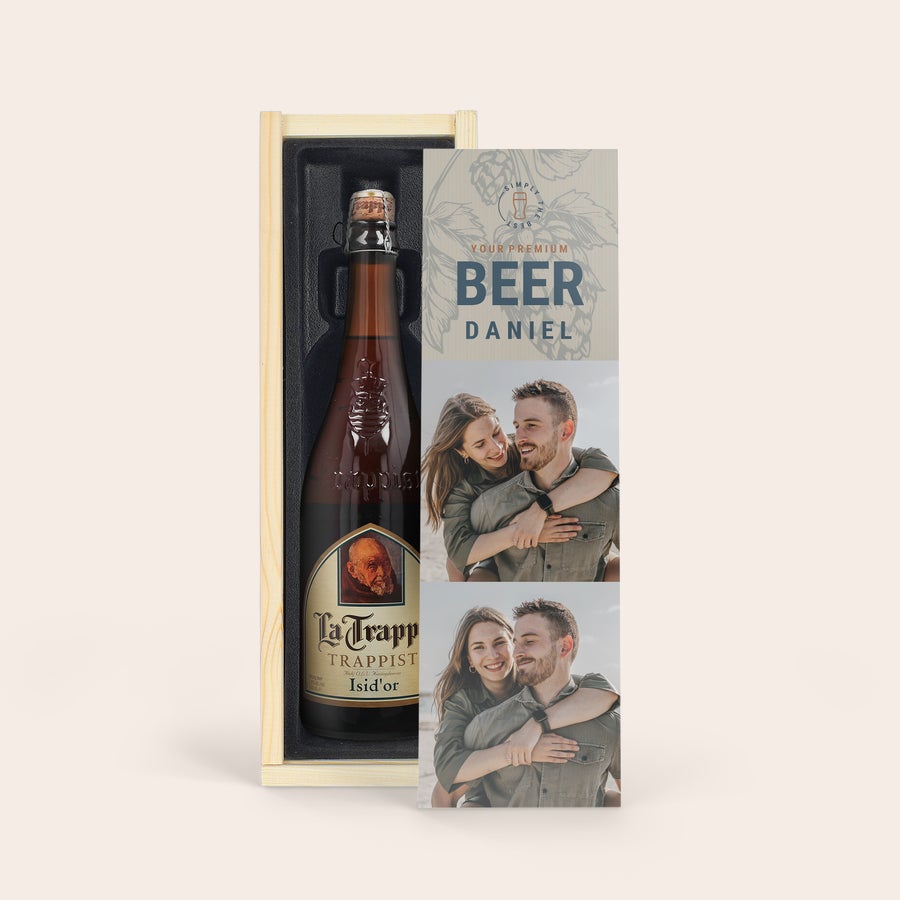 La Trappe Isid'or O sticlă de bere La Trappe Isid'or într-o cutie de lemn cu capac personalizat prin imprimare color cu două fotografii și textul Daniel