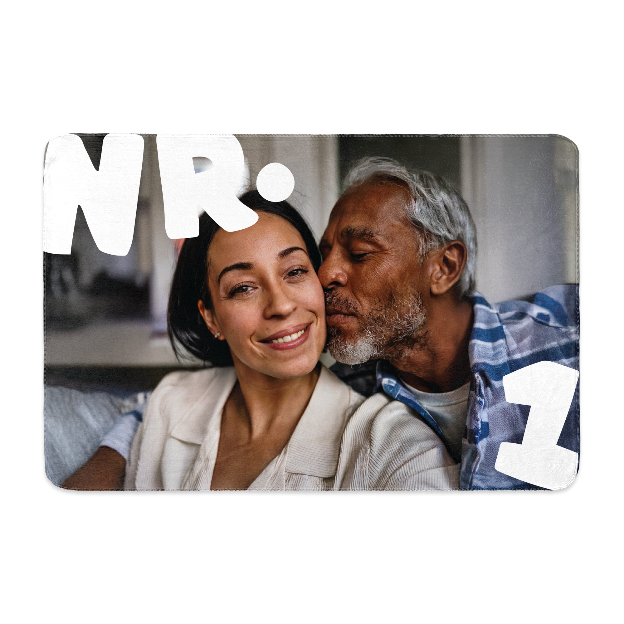 Personalised fleece blanket with a printed photo of a couple and custom text "NR. 1"