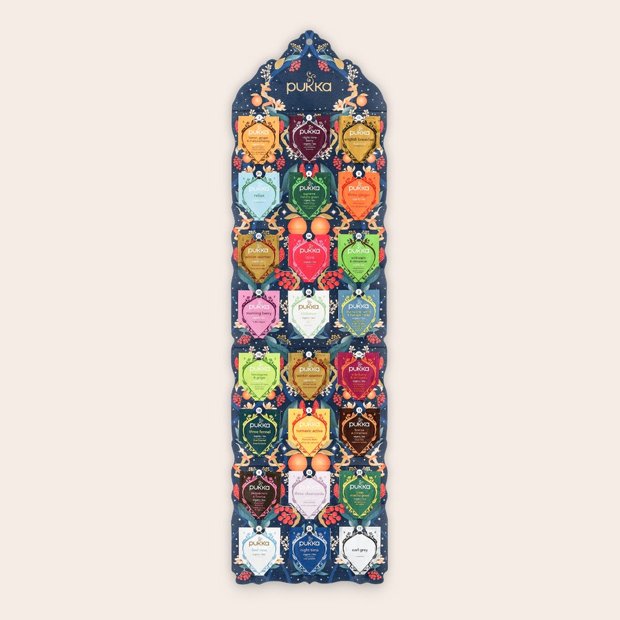 Pukka thee adventskalender Gepersonaliseerde thee adventskalender Pukka, met 24 theezakjes en bedrukt met een kleurrijk winterontwerp.