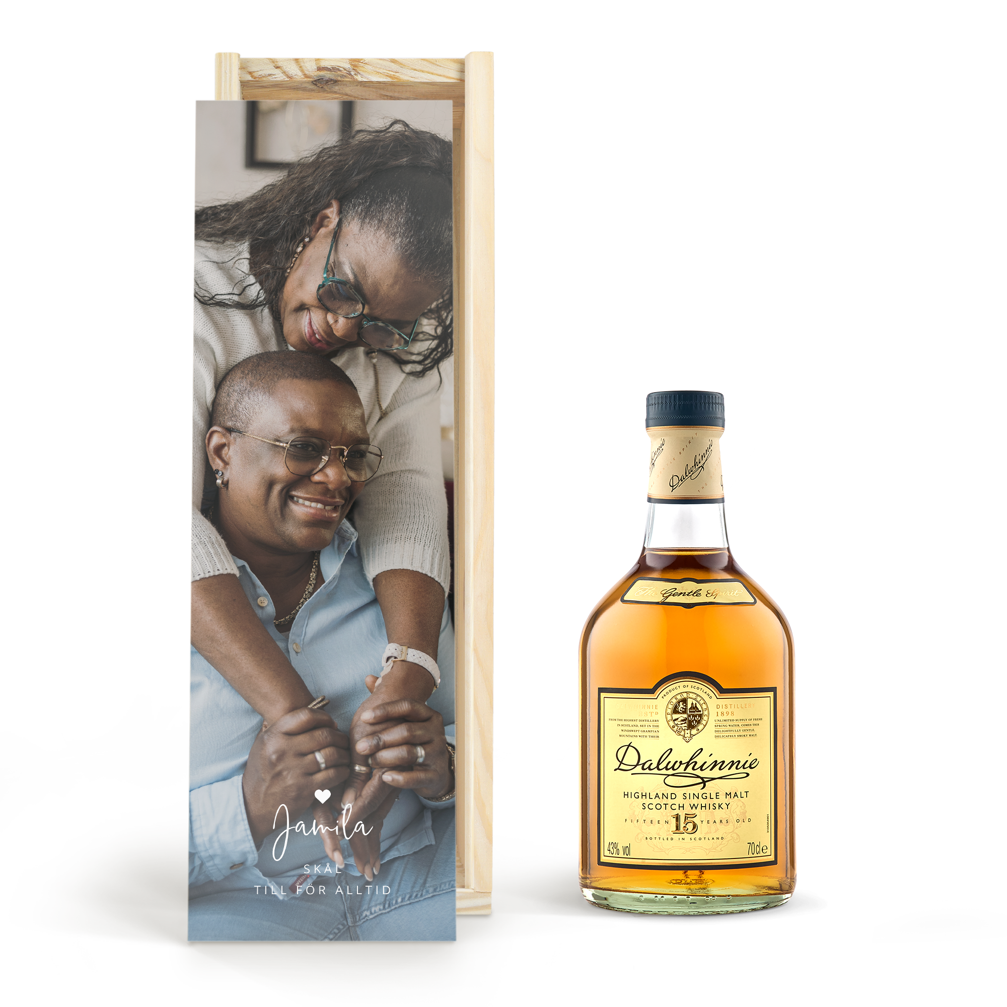 En personaliserad låda för whisky med ett tryckt foto och texten "Jamila Skål till för alltid" bredvid en flaska Dalwhinnie whisky.