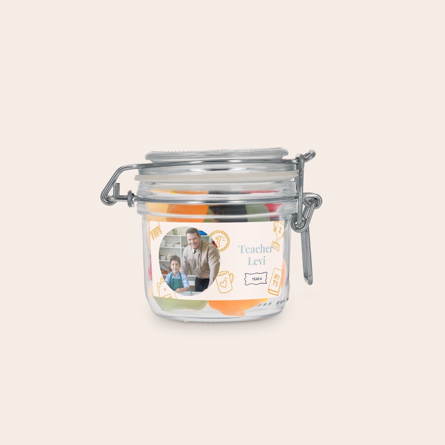 Personalised sweet jar Personalised sweet jar with winegums, printed with a photo, the text Teacher Levi, and Year 4