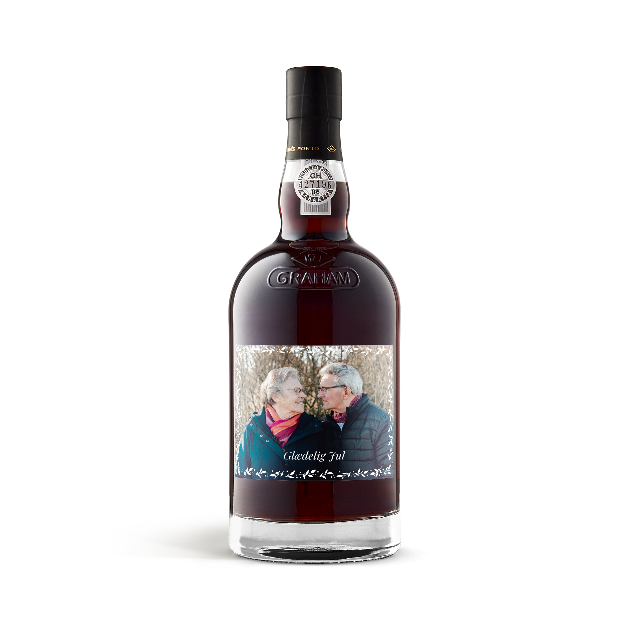 Graham's 10 års Tawny Port med et fotomærke af et ældre par og teksten Glædelig Jul. Giv en lækker flaske Grahams 10 års kaskade modnet med billedmærke som gave!