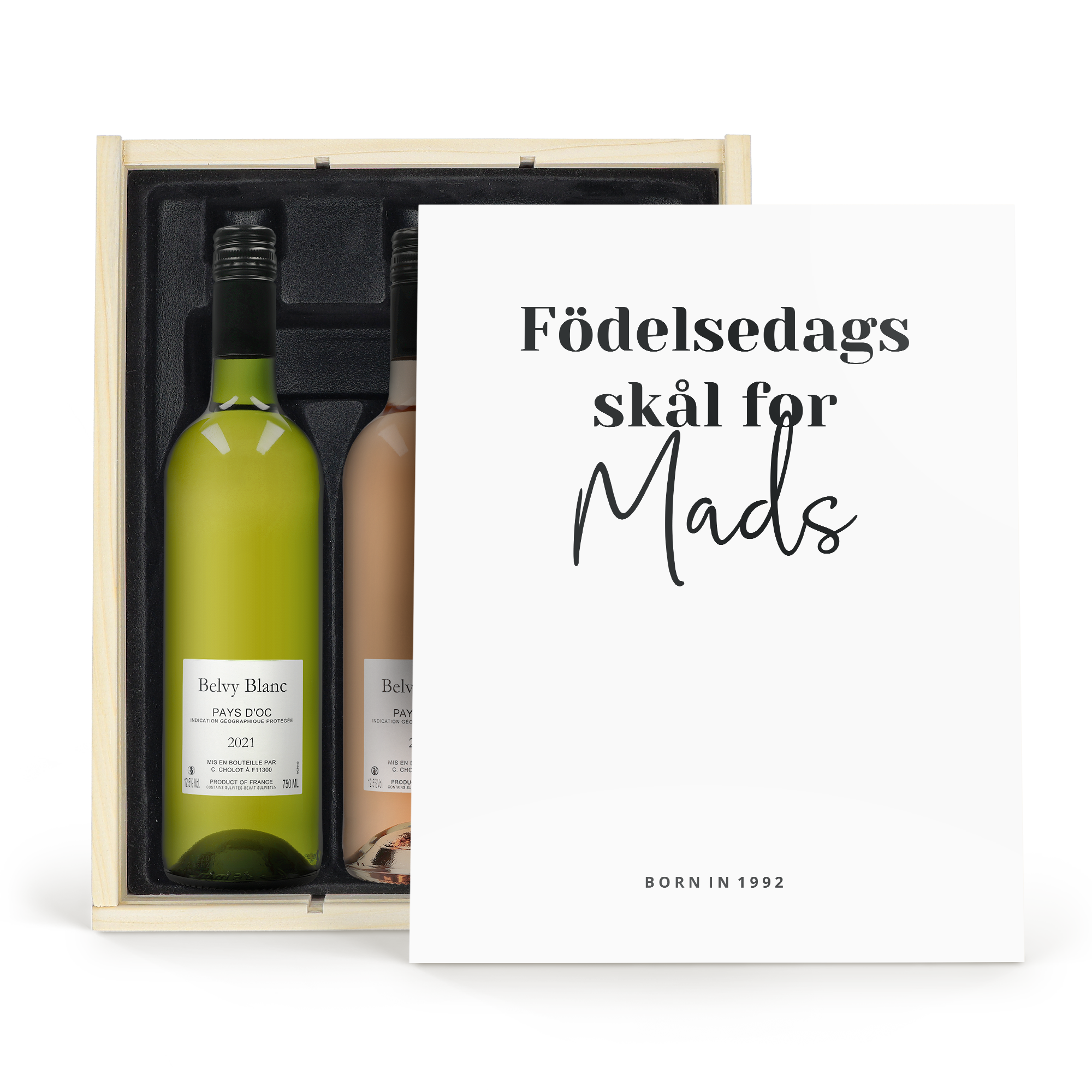 Unikt vinpaket med vitt, rött och rosévin från Belvy i en trävinlåda med texten Födelsedags skål för Mads BORN IN 1992.