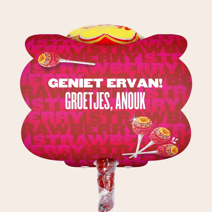 Mega Chupa Chups personaliseren Gepersonaliseerde Mega Chupa Chups aardbei met 20 lollys en de tekst 'GENIET ERVAN! GROETJES, ANOUK' geprint op de verpakking.
