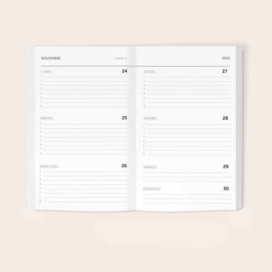 Agenda escolar 2025-2026 Agenda escolar personalizada abierta, mostrando las páginas de la semana 48 de noviembre de 2025.