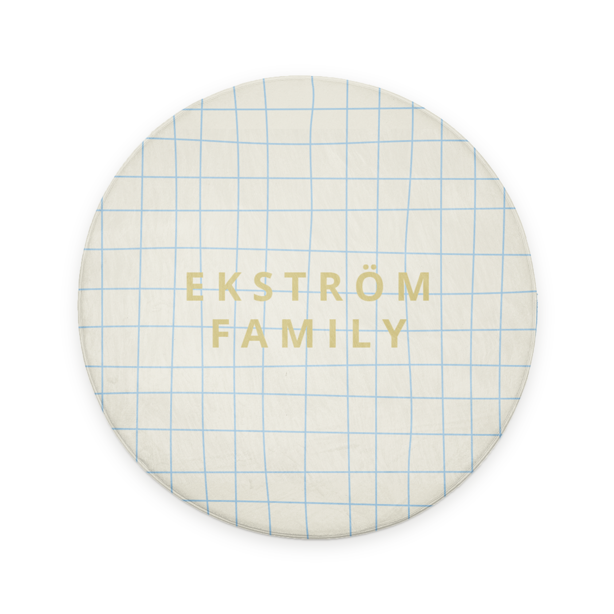 Rund personlig badrumsmatta med ett blått rutmönster och namnet "EKSTRÖM FAMILY" tryckt i guld.