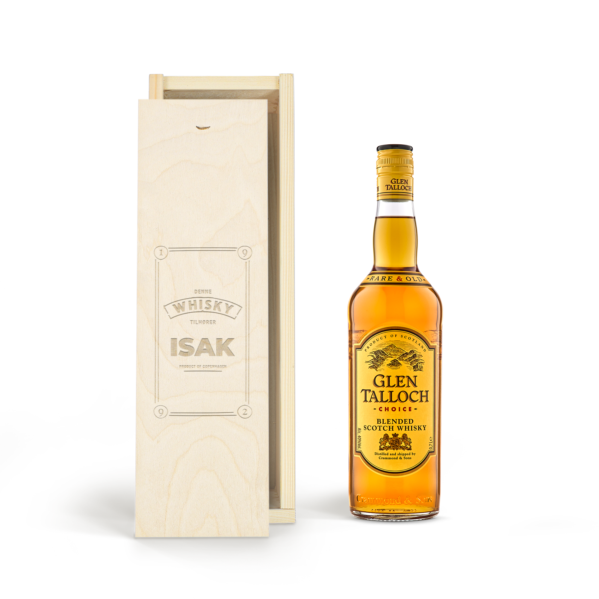 En flaske Glen Talloch whisky i en indgraveret trææske med teksten Denne whisky tilhører Isak