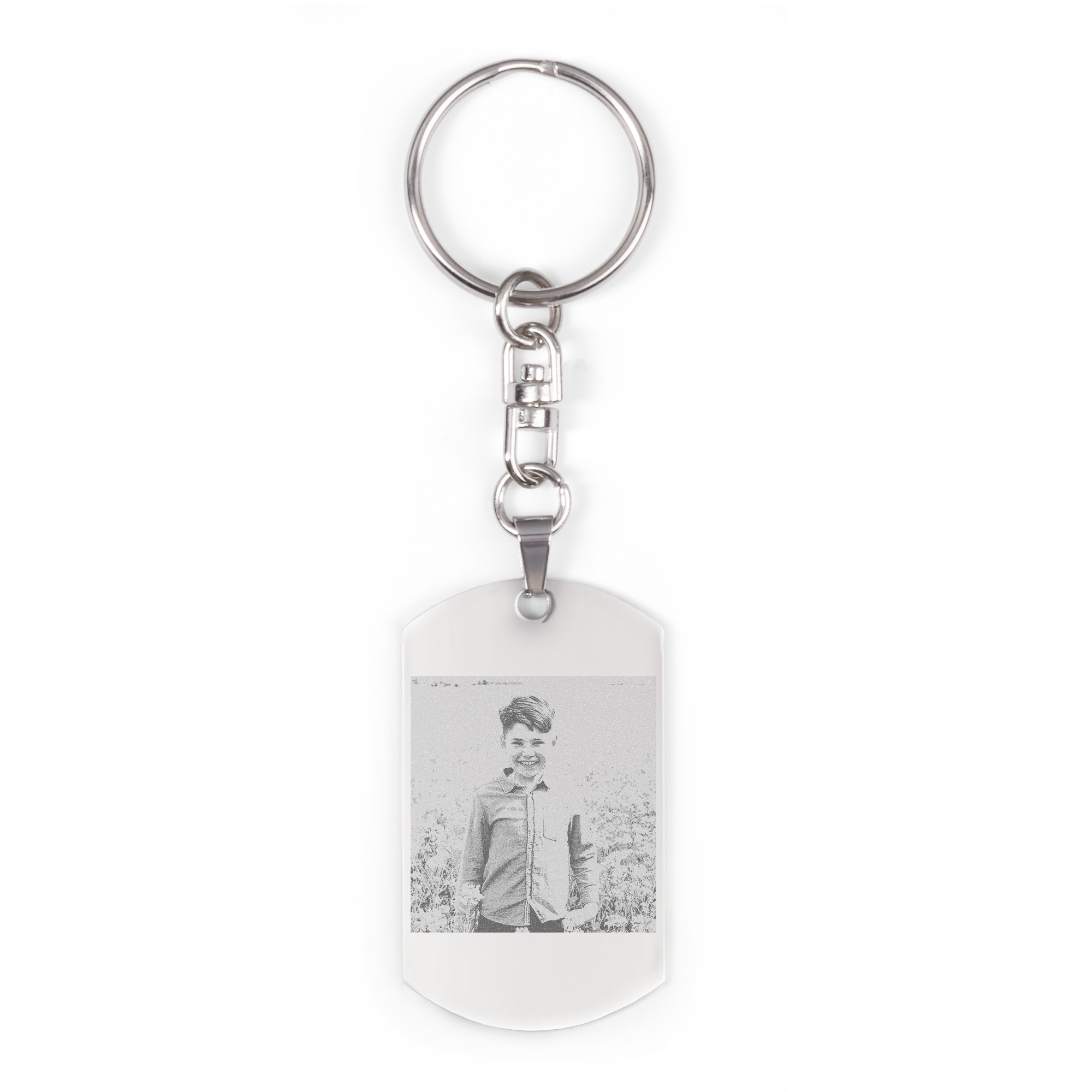 White photo keyring engraved with a smiling boy as a personalized photo gift