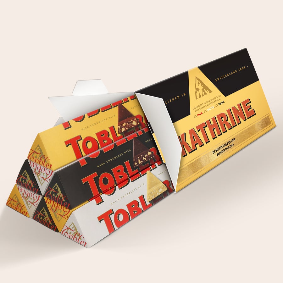 Toblerone med navn Denne personlige XL Toblerone Selection chokoladebar er en virkelig stor overraskelse, trykt med navn Kathrine og beskeden De bedste dage er dem sammen med dig.