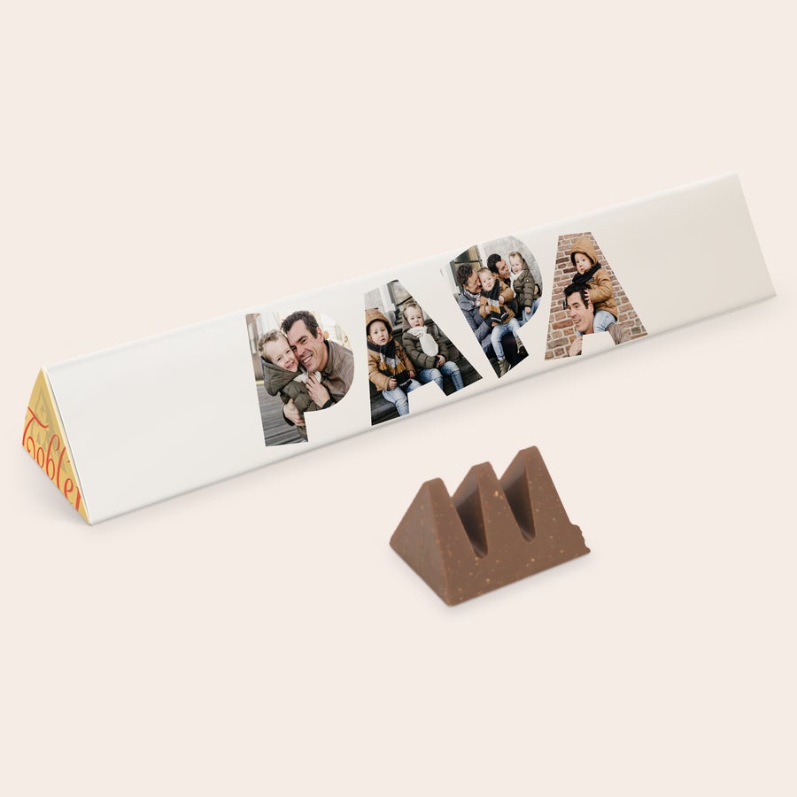 Toblerone XXL mit Namen Die personalisierte Toblerone XXL mit dem Namen P-A-P-A, erstellt aus Familienfotos, ist eine riesen Überraschung!