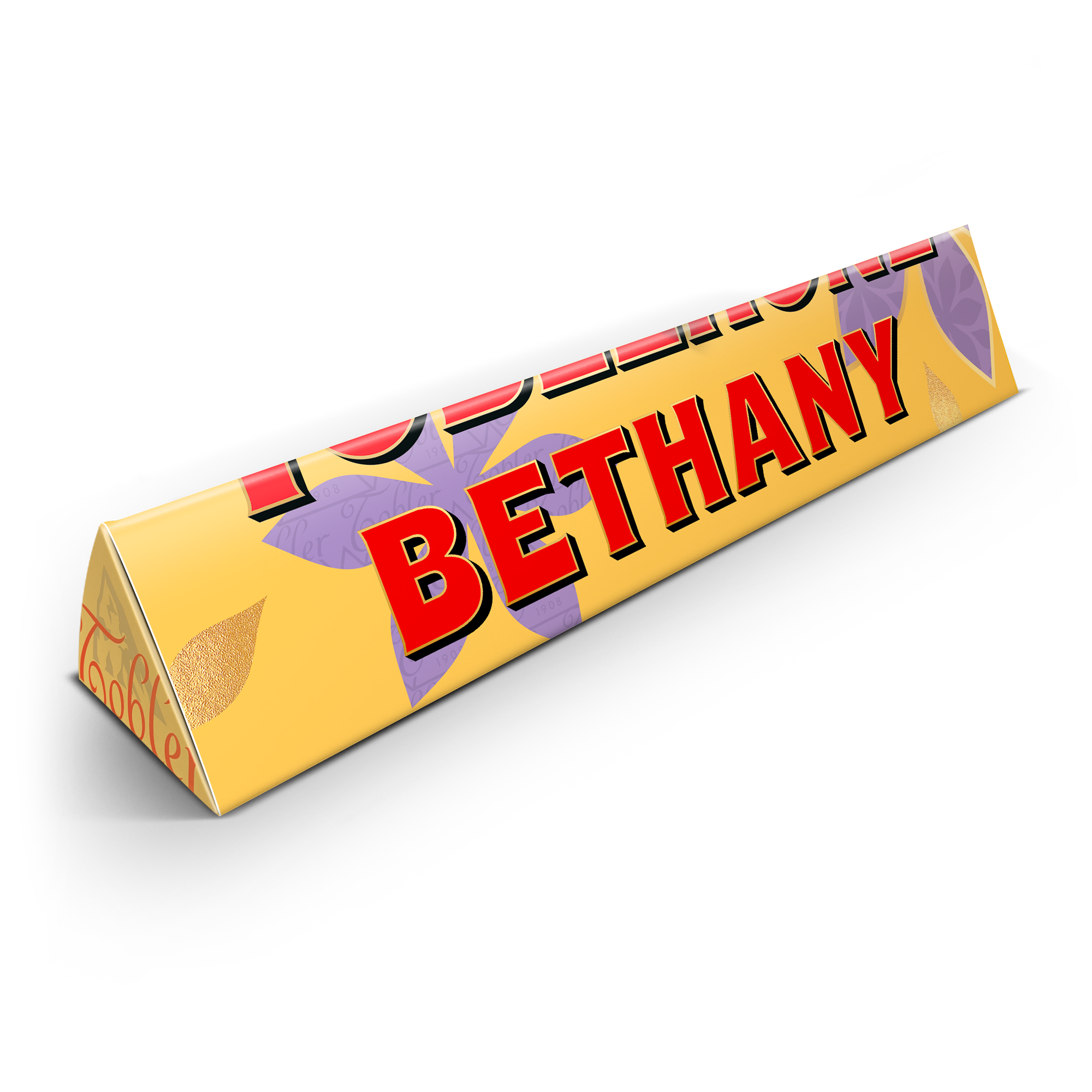 Toblerone-suklaalevy keltaisessa kääreessä painetulla nimellä BETHANY, yllätä äitisi henkilökohtaisella Toblerone-suklaalevyllä