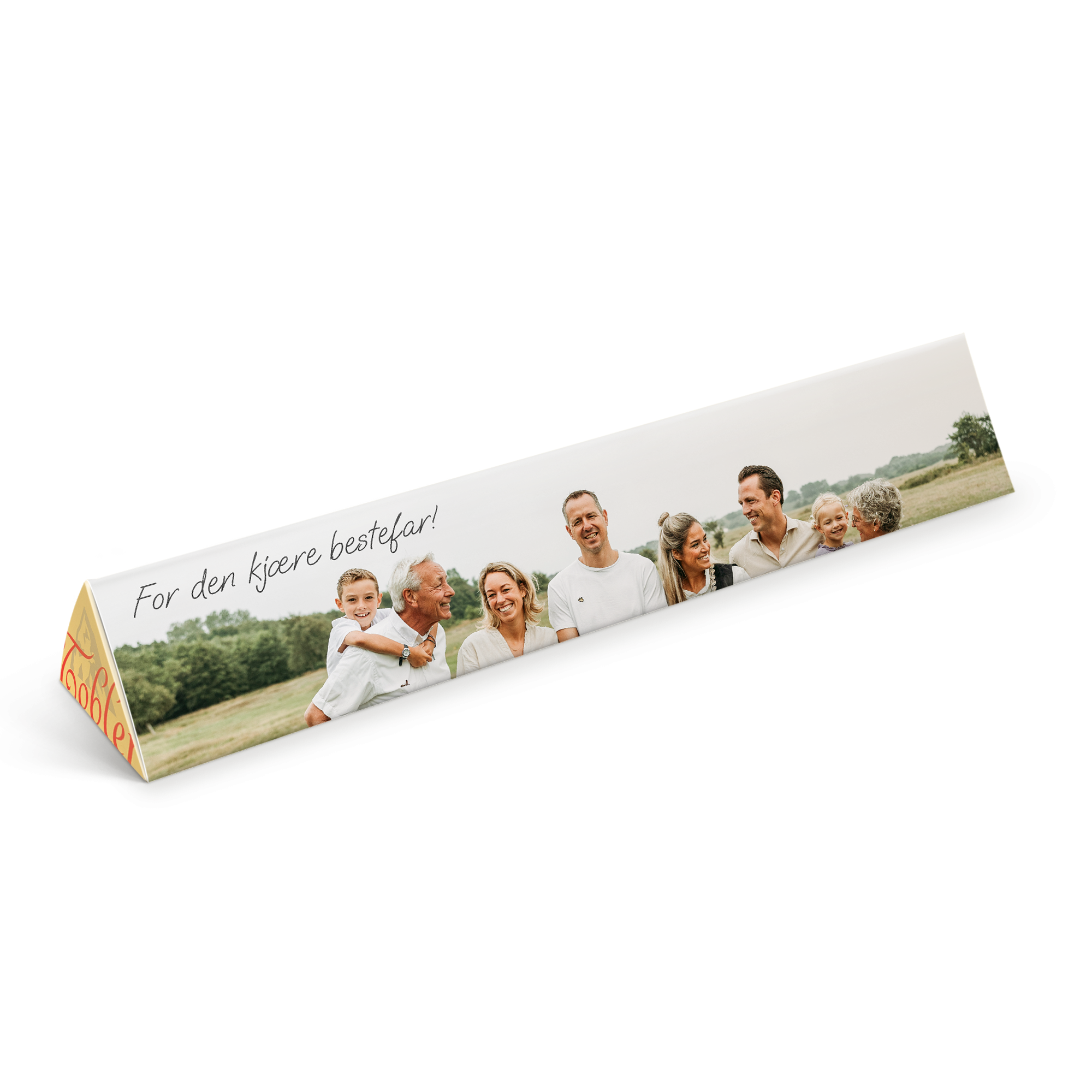 Den personlige Toblerone-sjokoladen med trykt familiebilde og teksten For den kjære bestefar