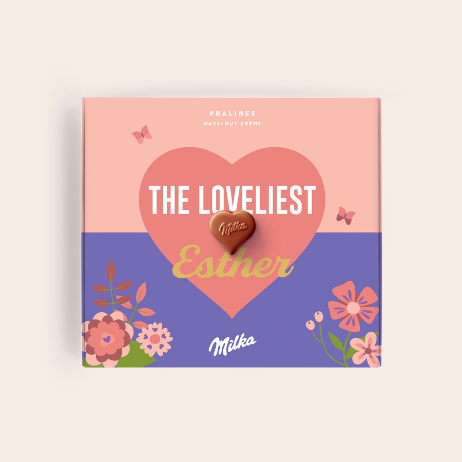 Milka Pralinky Den matek Personalizovaná dárková krabička Milka s nápisem THE LOVELIEST ESTHER na Den matek, potištěná s velkým srdcem a květinami