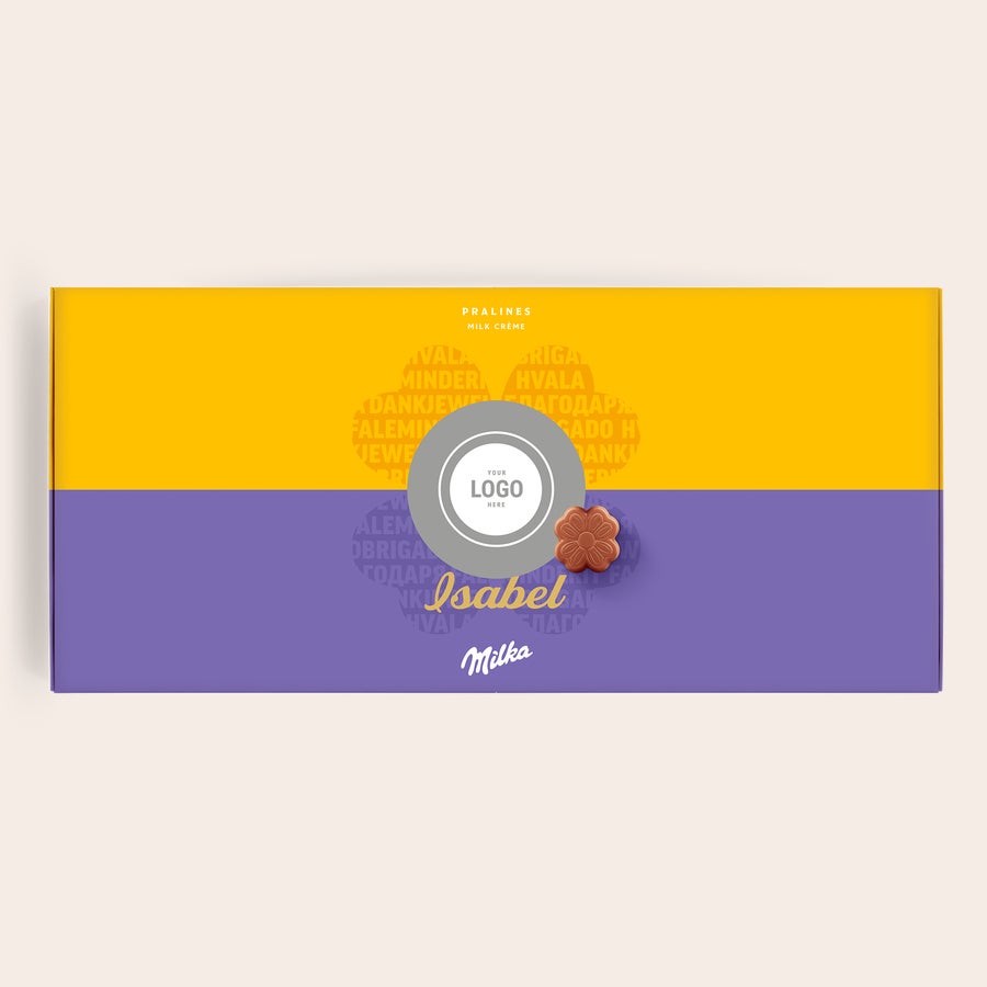 Milka Praliinit Kiitos Yksilöllinen Milka-suklaarasia oranssin ja violetin sävyissä, painatettu nimellä Isabel ja logopaikka.