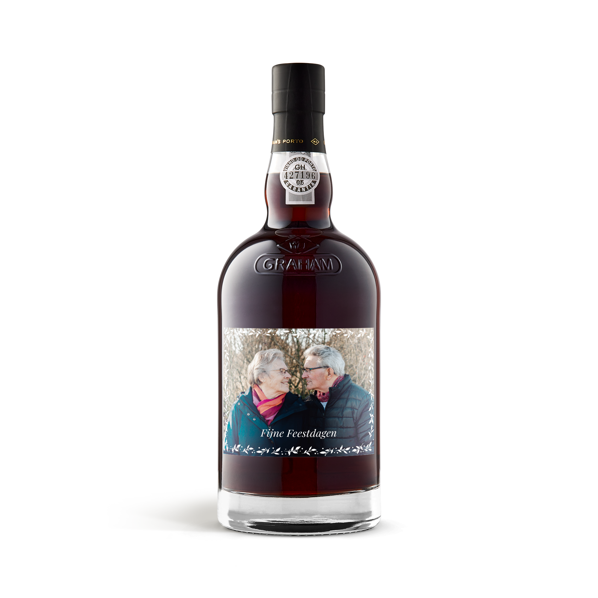 Fles Graham's port met persoonlijk etiket geprint met foto van stel en 'Fijne Feestdagen'.