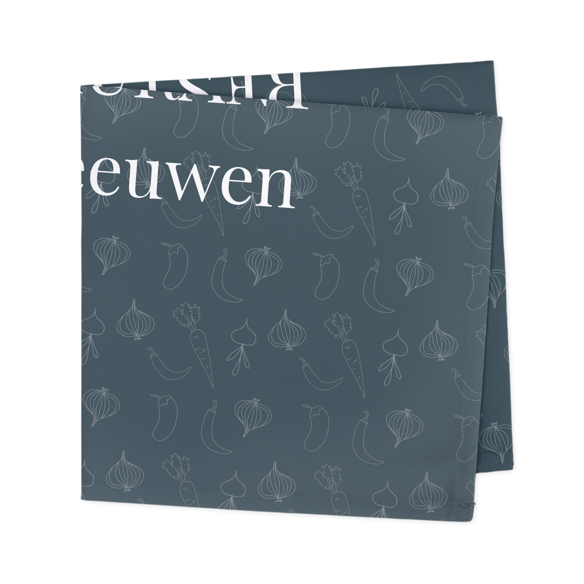 Bedrukte servetten met wit opschrift 'Leeuwen' en een patroon van getekende groenten voor een feestje aan tafel