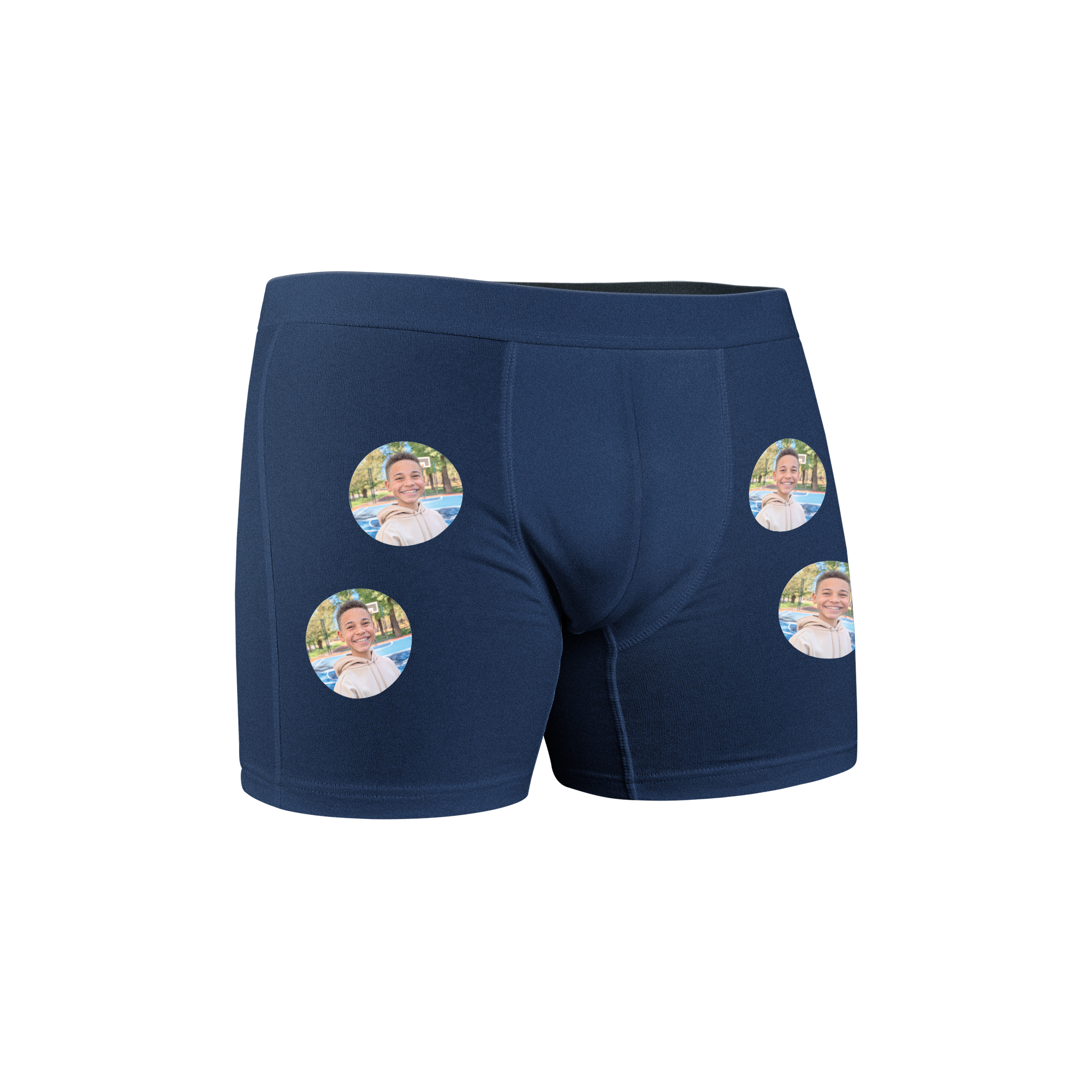 Marineblaue personalisierte Boxershorts mit einem aufgedruckten Foto eines lächelnden Jungen, mehrfach auf dem Stoff platziert