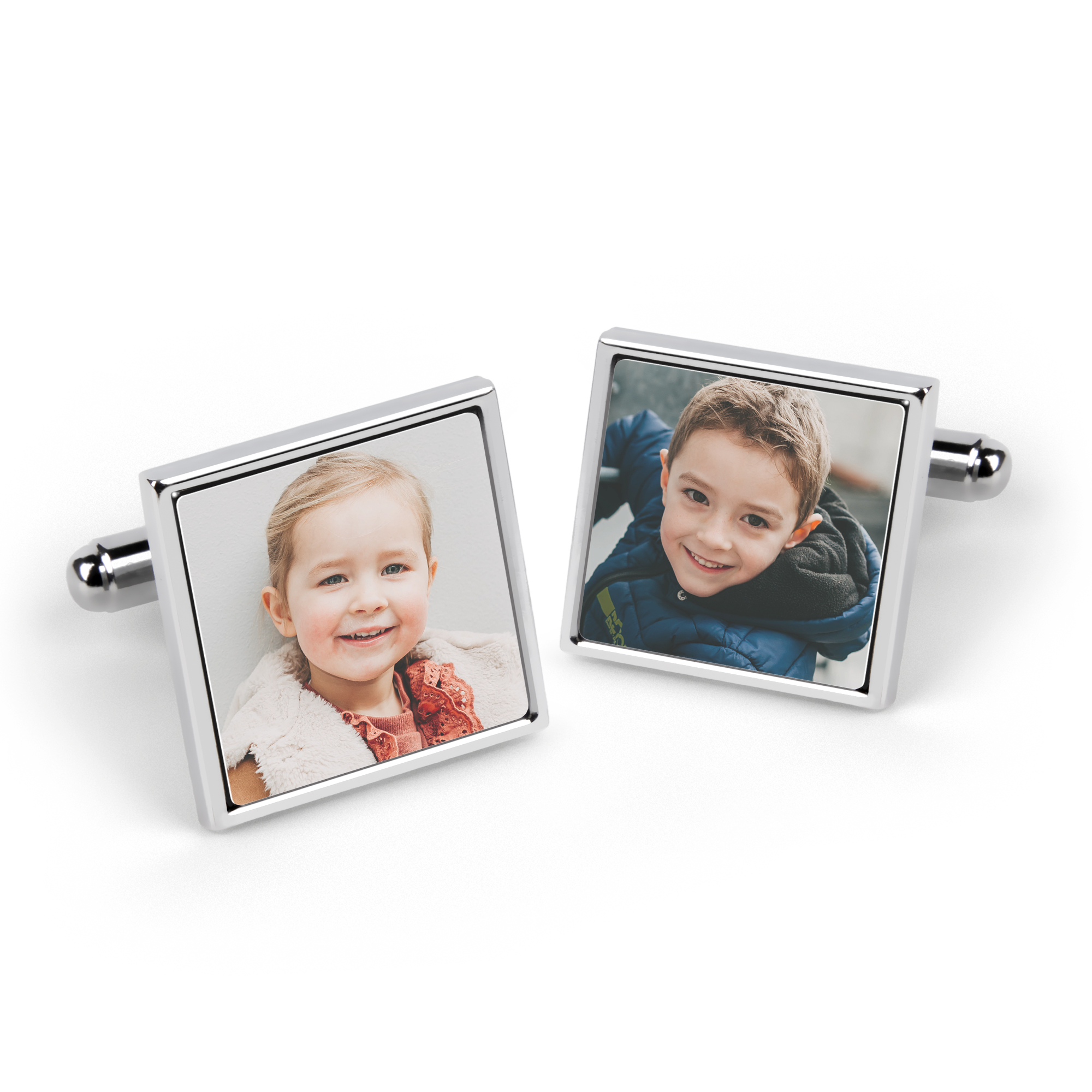 Two silver square cufflinks, each printed with a different photo of a smiling child, perfect for a personalized gift.