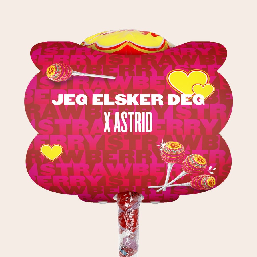 Mega Chupa Chups - personlig Mega Chupa Chups personlig Jordbær 20 ispinner med "Jeg elsker deg x Astrid" trykt på kortet.